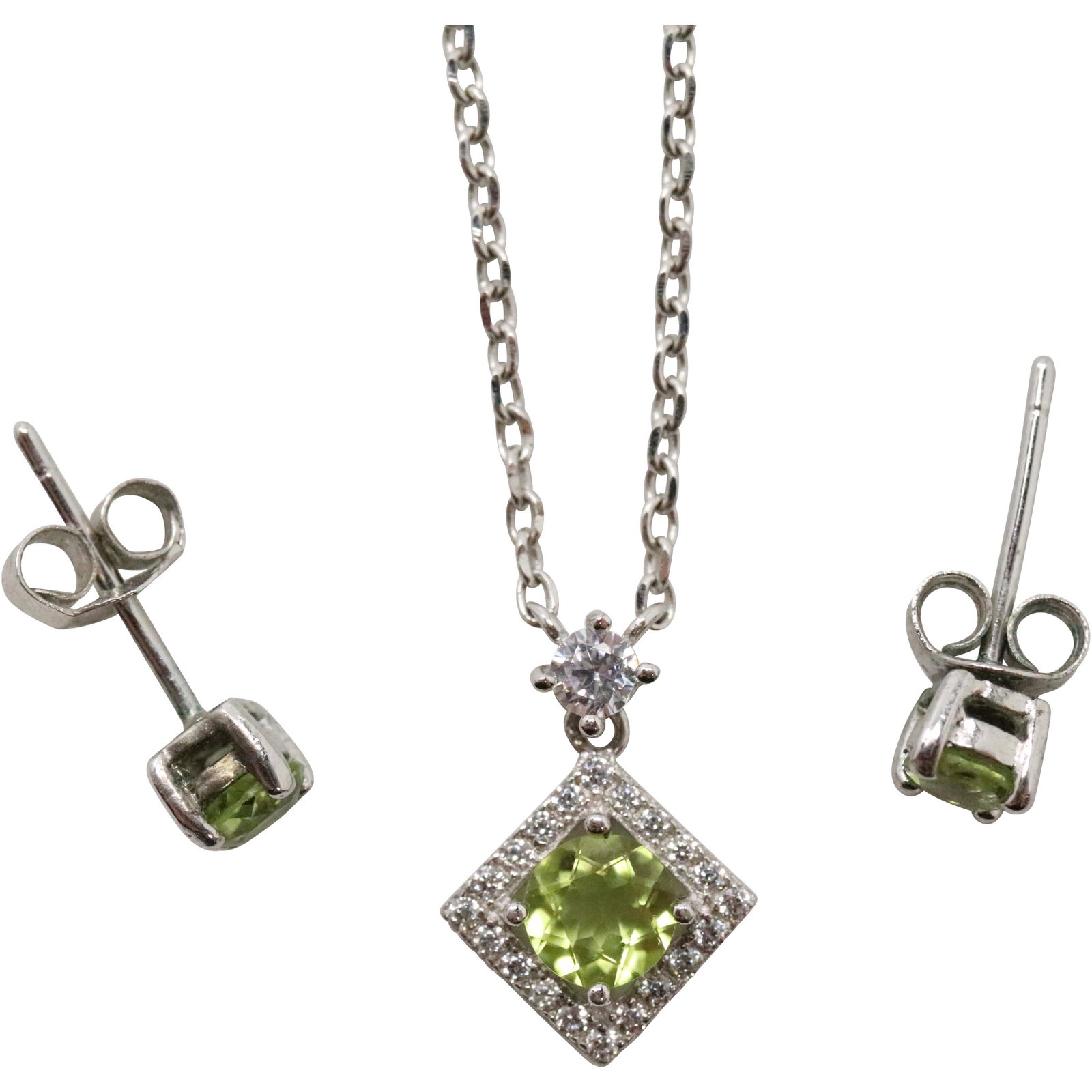.925 Sterling CZ Peridot Necklace and Matching Earrings: .925 Sterling Silver CZ and Peridot Pendant Necklace and Matching Peridot Earrings. Marked: .925 ; Size: chain 16 in. length