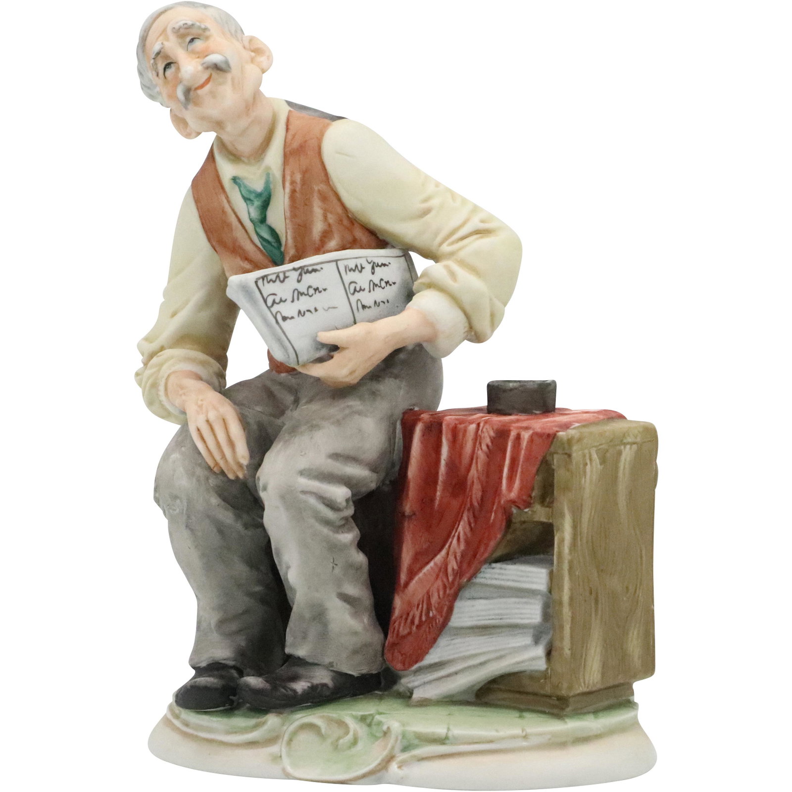 Capodimonte Porcelain Elder Man Reading a Newspaper: Capodimonte Porcelain Elder Man Reading a Newspaper. Size: 7.5 h 5.5 w