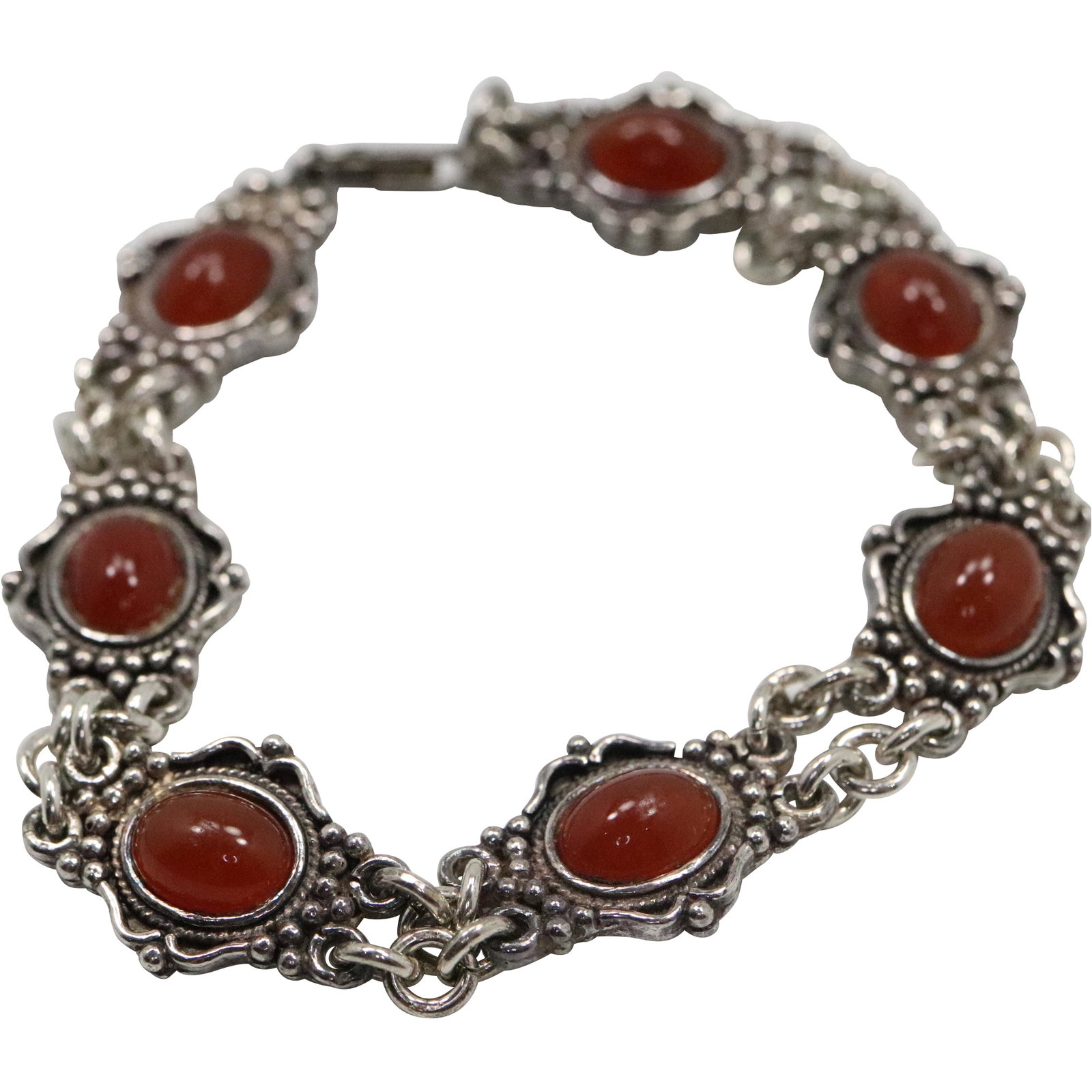 .925 Sterling Silver Carnelian Bracelet: .925 Sterling Silver Carnelian Bracelet. Marked: .925 ; Size: 7 1/4 in. x 1/2 in.