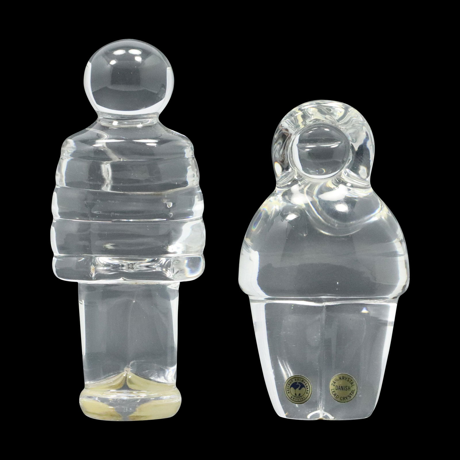 [2] Signed HOLMEGAARD Danish Crystal Glass Figures: [2] Signed HOLMEGAARD Danish Crystal Glass Figures. Size: (lady 4.5h 2.5w), (5.5h 2.25w)