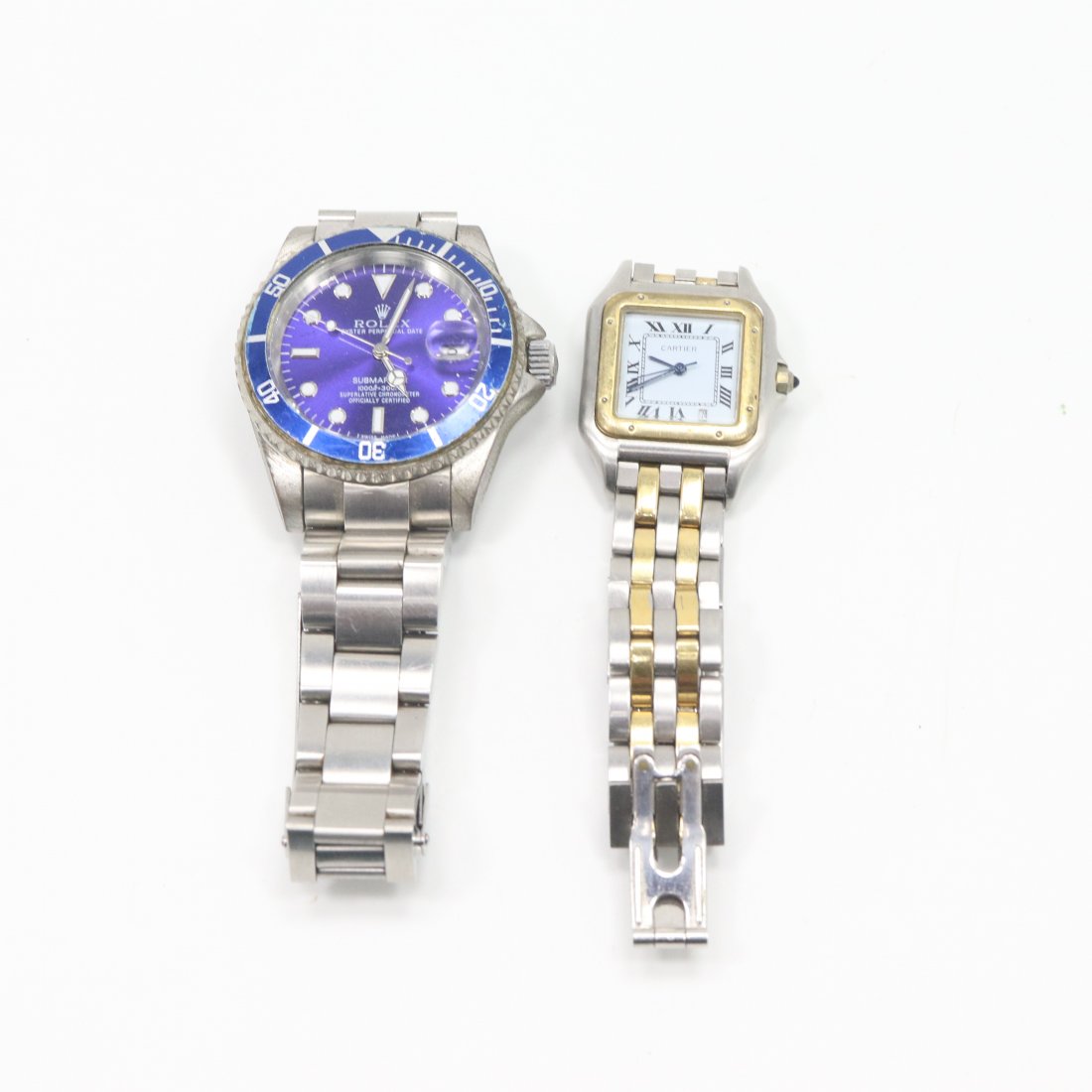 Faux Rolex [with box] and Faux Cartier Wristwatches: Faux Rolex [with box] and Faux Cartier Wristwatches. Size: Box size 4 in. x 4 in. x 3 1/4 in. Authenticity doubtful, calling them both Faux.