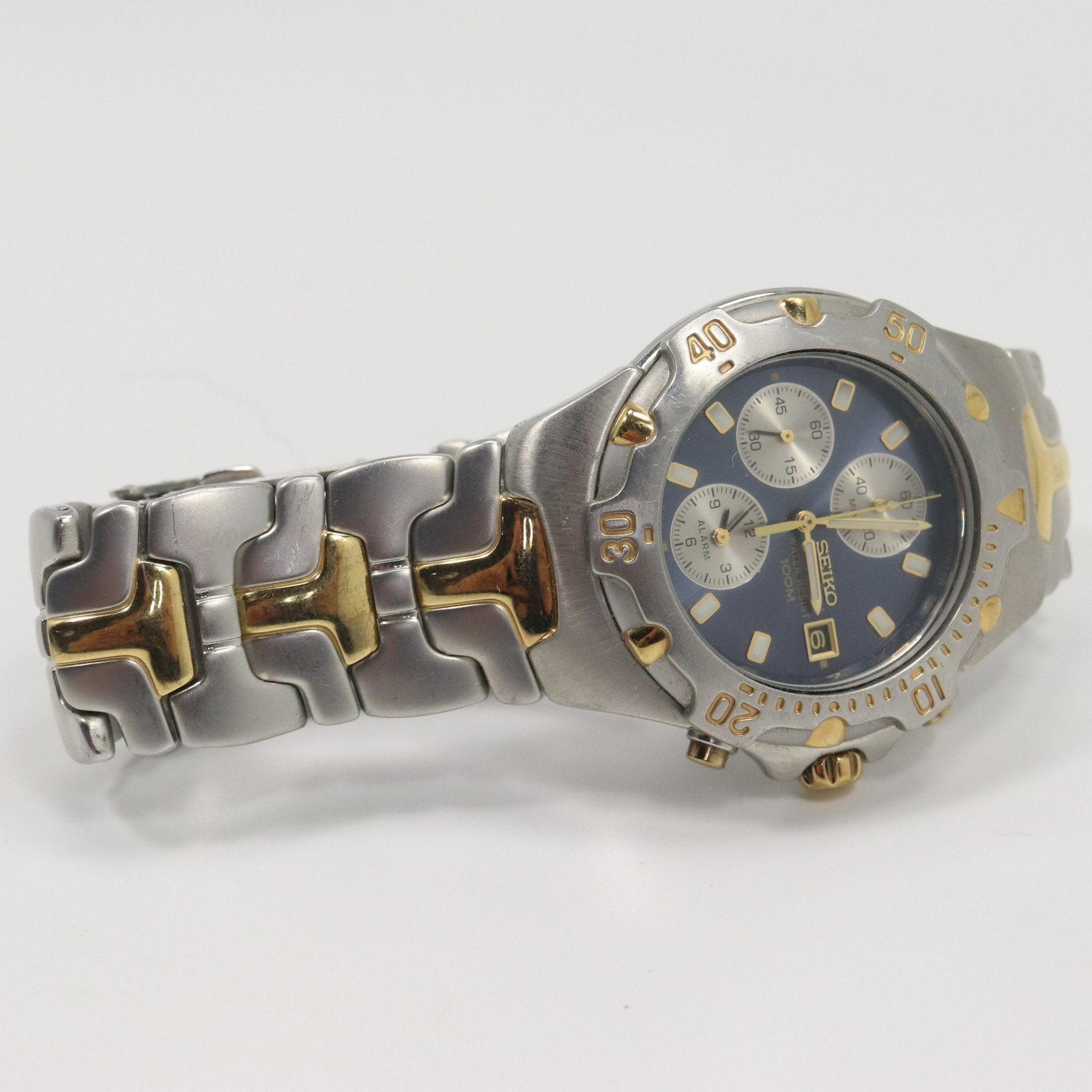 Seiko Chronograph Stainless & Gold Tone 100M Wristwatch: Seiko Chronograph Stainless & Gold Tone 100M Wristwatch. Water Resist. Size: face: 1 7/8 in.
