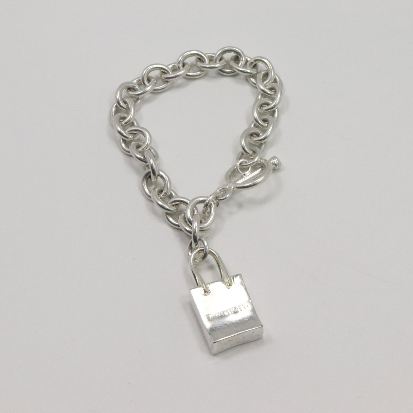 Tiffany & Co .925 Sterling Silver Bracelet w/ Bag Charm (1 of 6)