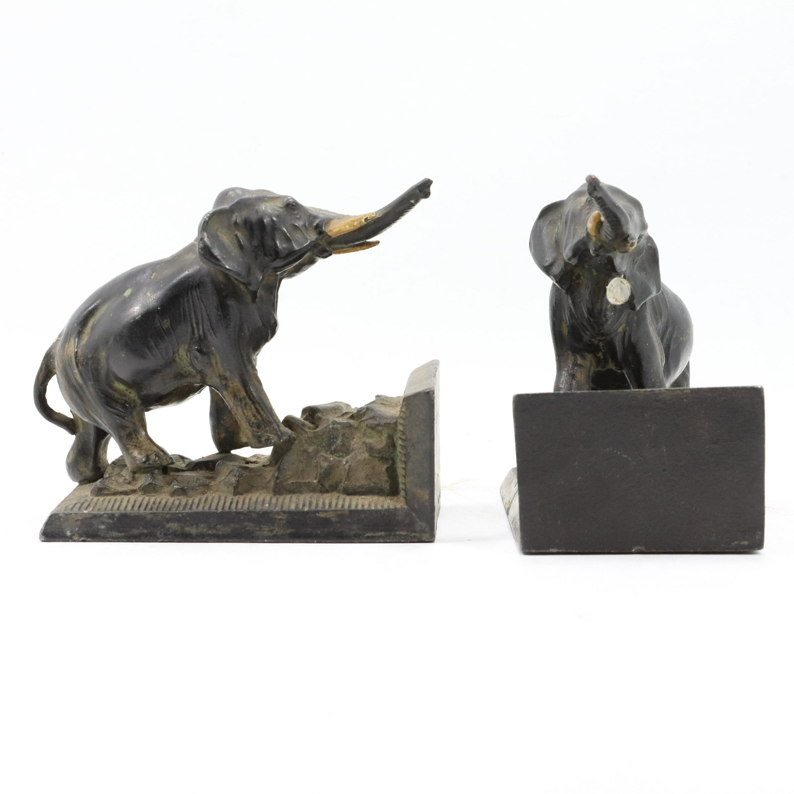 Vintage c. 1920s Cast Metal Elephant Figure Bookends: Vintage c. 1920s Cast Metal Elephant Figure Bookends, Old bronze patina finish. size: 5.5h 5.75w