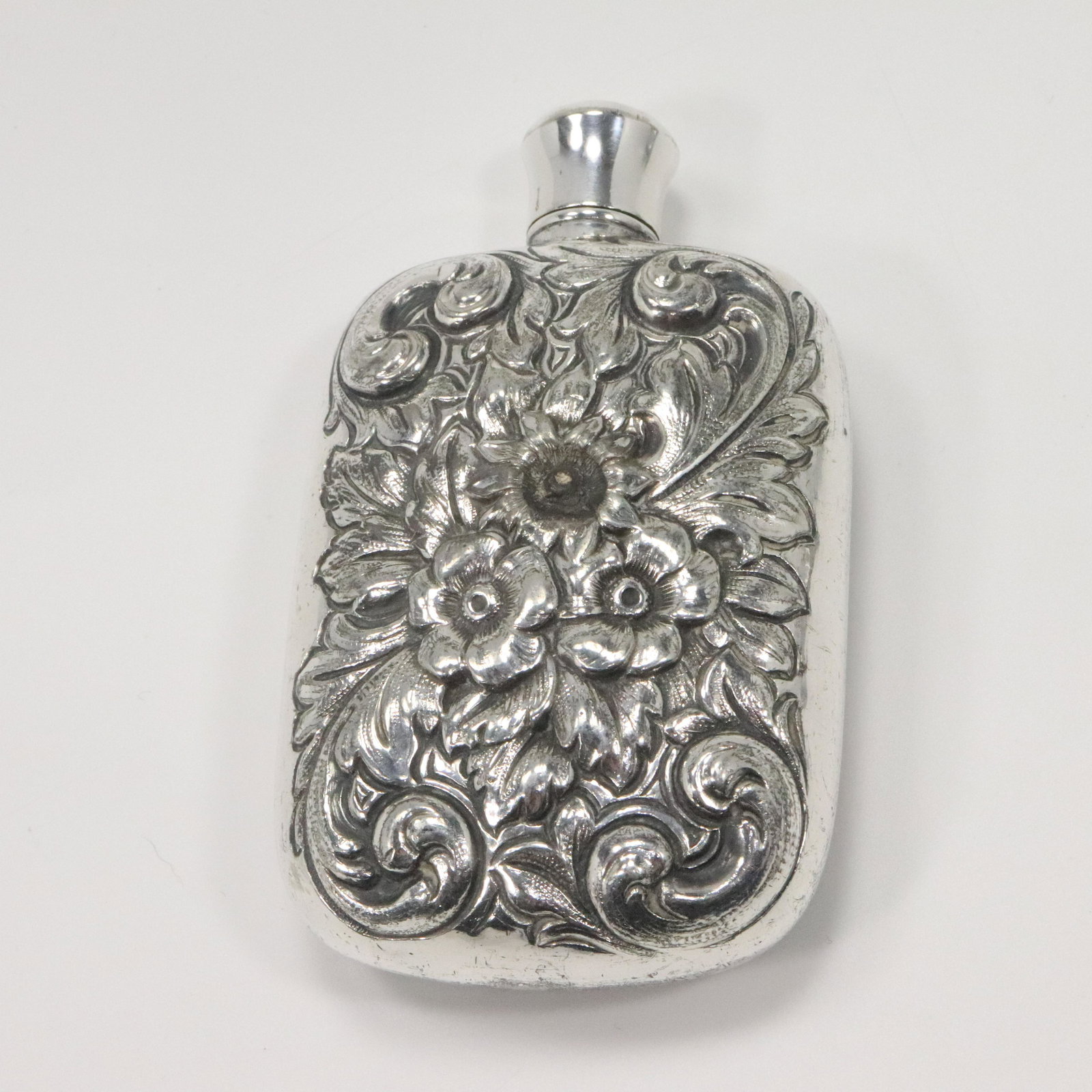 Sterling Silver Heavy Thick Embossed Floral Flask: Sterling Silver Heavy Thick Embossed Floral Flask. [tests Sterling] Size: 4x2.5