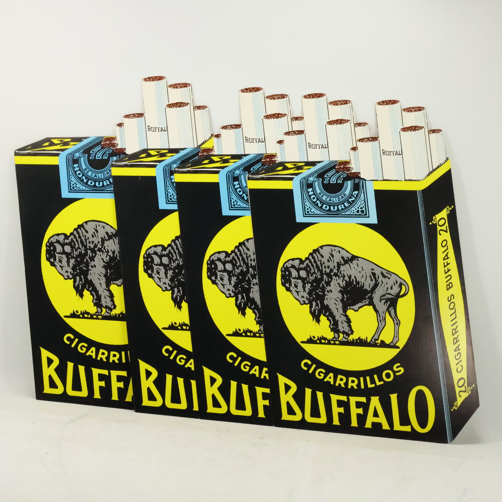 4 Cardboard Advertising Signed BUFFALO Cigarrillos: 4 Cardboard Advertising Signed BUFFALO Cigarrillos [Cigarettes]; Good lithography. Size: 18 h 10.5 w