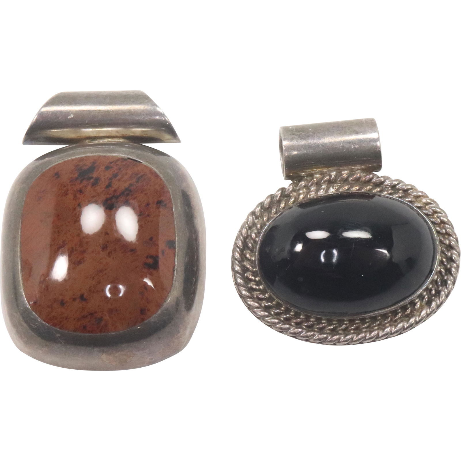 2 Large .925 Sterling Pendants Jasper and Black Onyx: 2 Large .925 Sterling Pendants Jasper and Black Onyx. Both marked .925 Mexico; Jasper 1 3/4 in. x 1 1/4 in. ; black onyx 1 3/8 in. x 1 3/8 in.