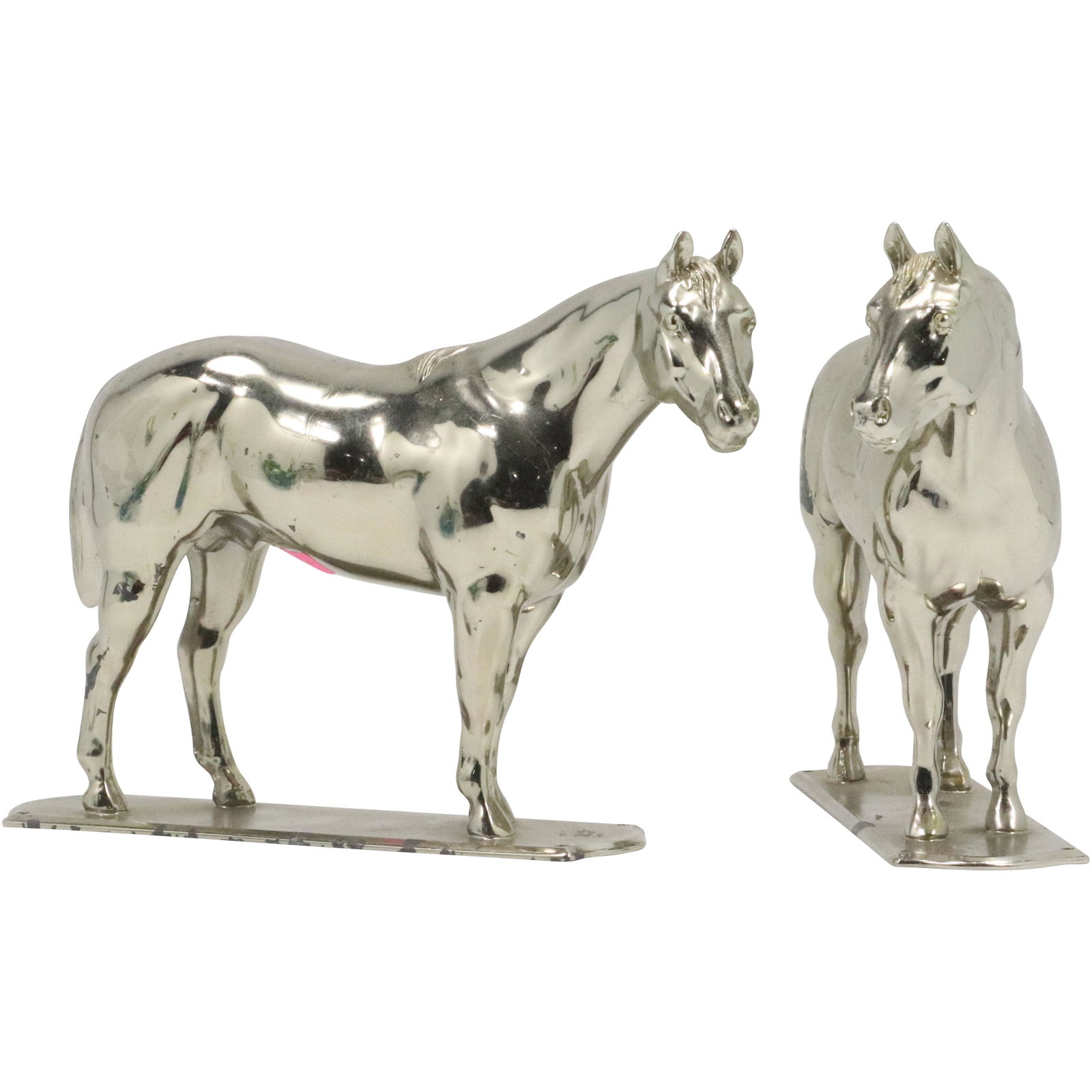 Chromed Bronze Thoroughbred Horse Bookends Gladys Brown: Pair of Chromed bronze metal Thoroughbred Horse Bookends designed by Gladys Brown Edwards and produced by the Dodge Company of Los Angeles in the late 1940s. Marked: c. Gladys Brown. size: 7h 10w
