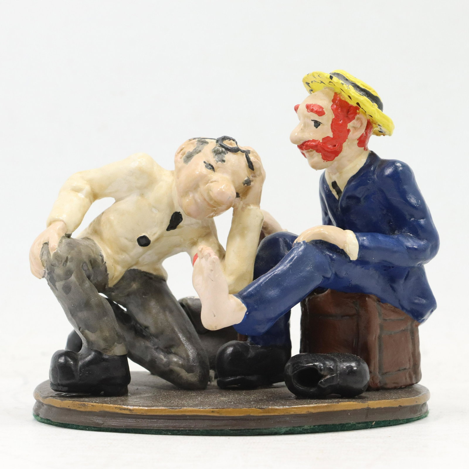 Eve Bell Original Sculpture Edition 250, Two Men: Eve Bell Original Sculpture Edition 250, Two Men in conversation. size: 5.5h 6.5w