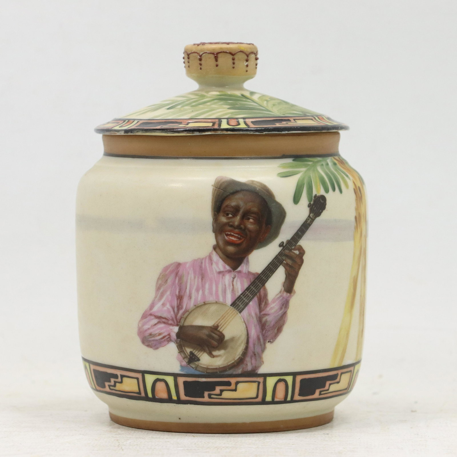 Nippon Black Americana Banjo Player Tobacco Jar: Nippon Black Americana Banjo Player Tobacco Jar. Marked: Hand Painted Nippon. size: 5.75h 4.25w