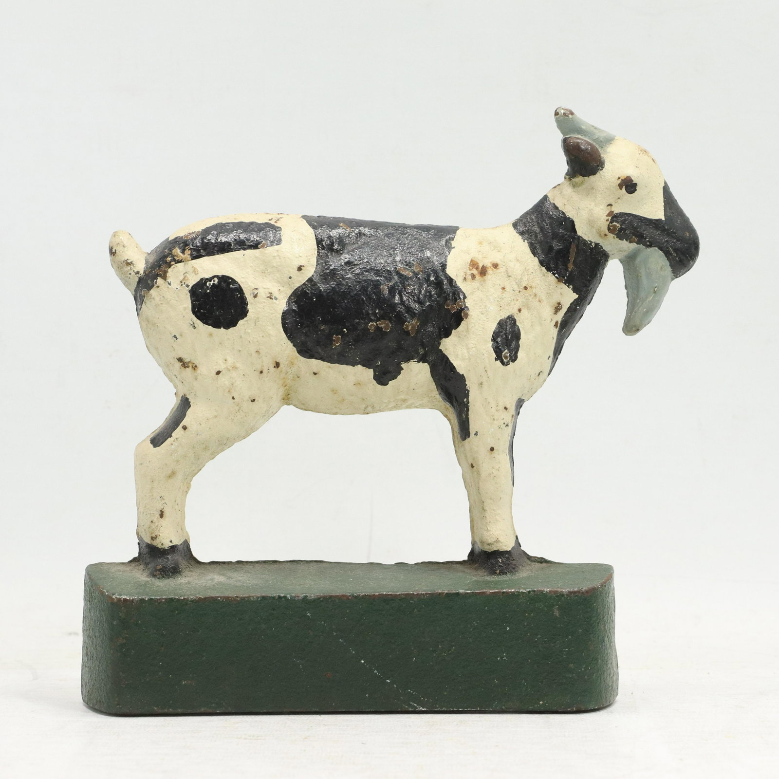 Cast Iron Mountain Goat Figure Door Stop: Cast Iron Mountain Goat Figure Door Stop. Original paint finish. size: 8.25h 8.25w