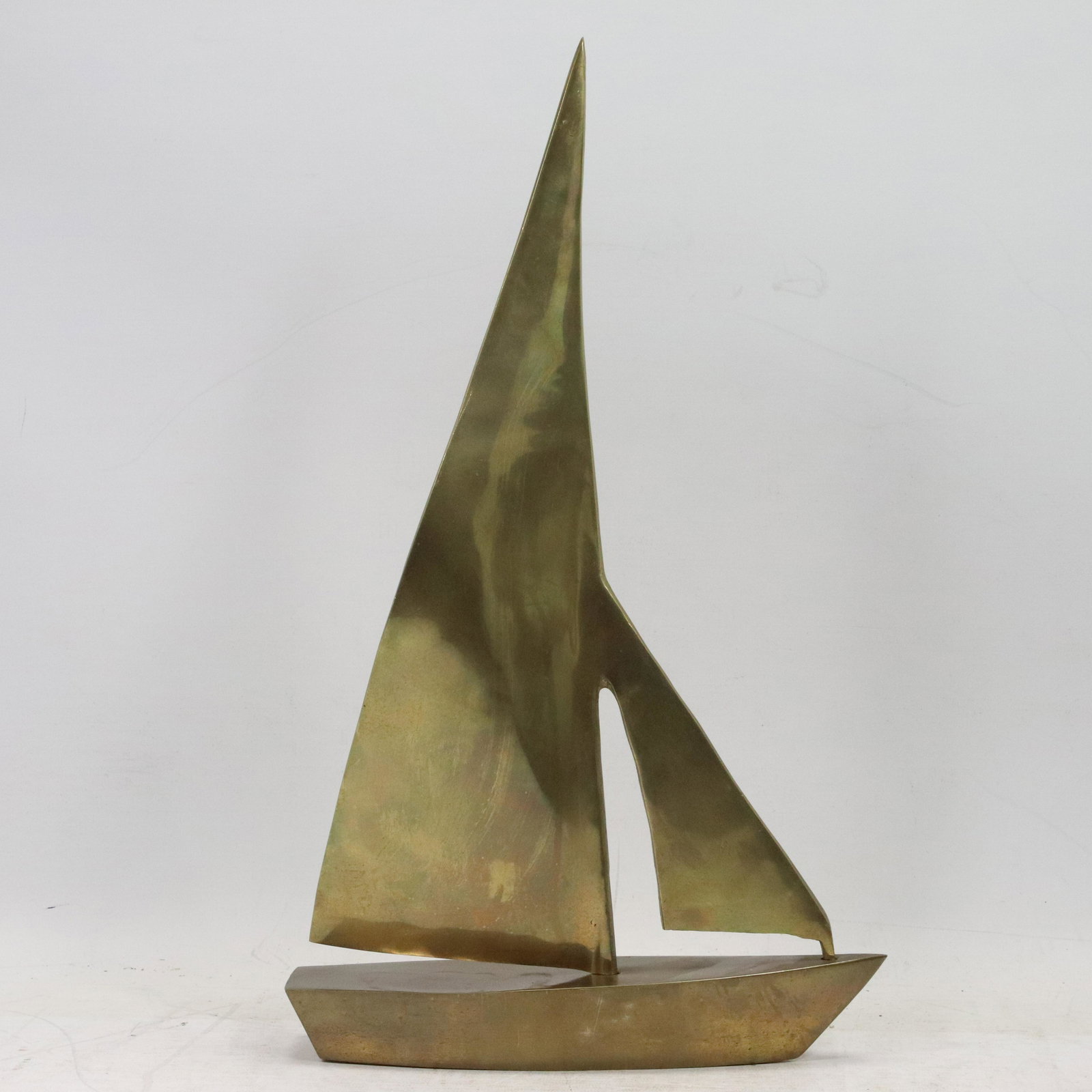Mid-Century Modern Brass Sail Boat Sculpture: Mid-Century Modern Brass Sail Boat Sculpture. size: 16.25h 9.5w