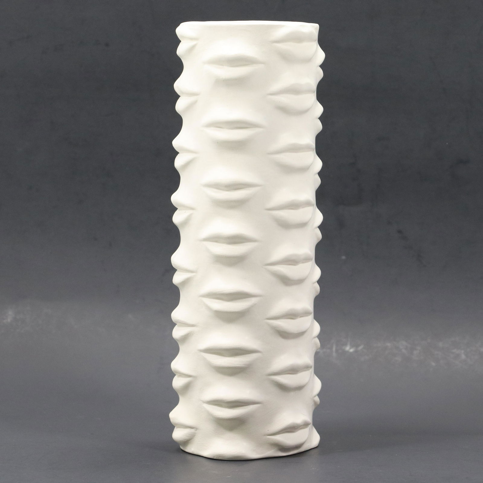 White Ceramic Cylindrical Perpetual Vase "Lips" Pattern (1 of 7)