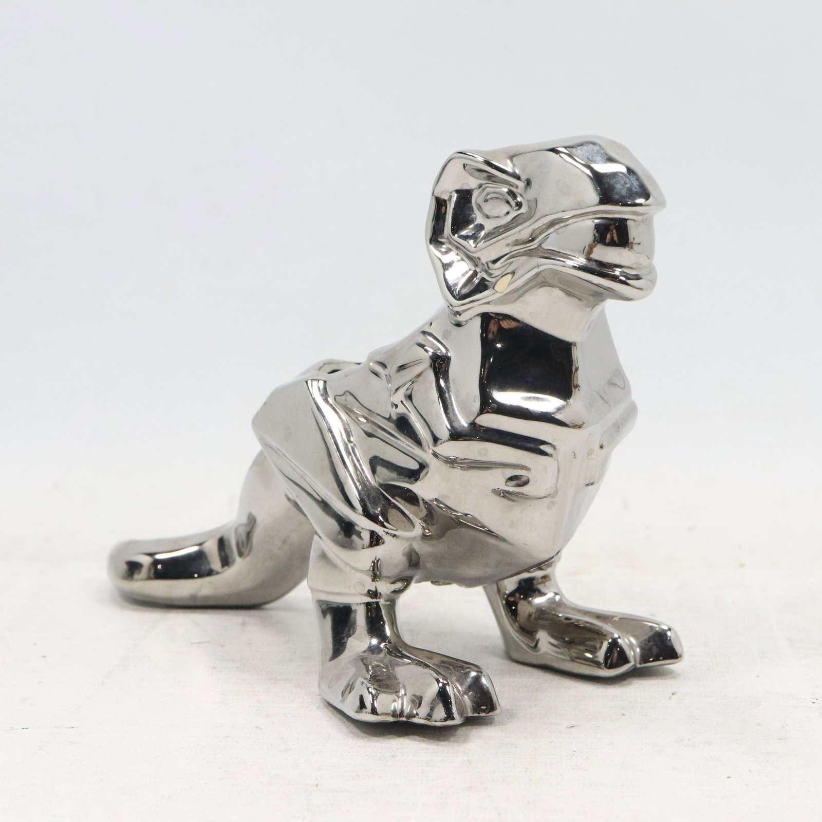 Chrome Plated Ceramic Cubistic Dinosaur Figure Planter: Chrome Plated Ceramic Cubistic Dinosaur Figure Planter. Size: 6h 9w