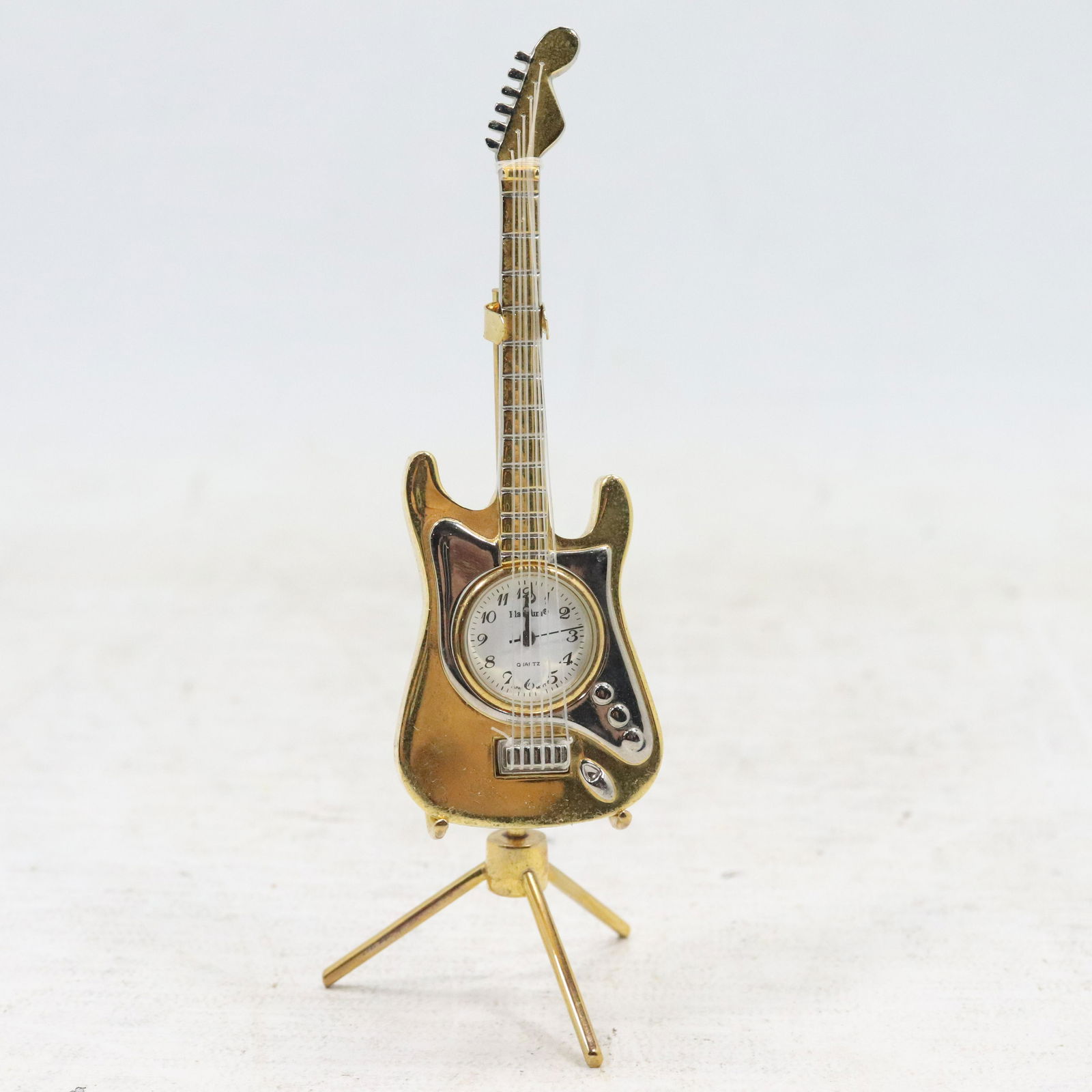 Novelty Brass Electric Guitar Clock on Stand (1 of 7)