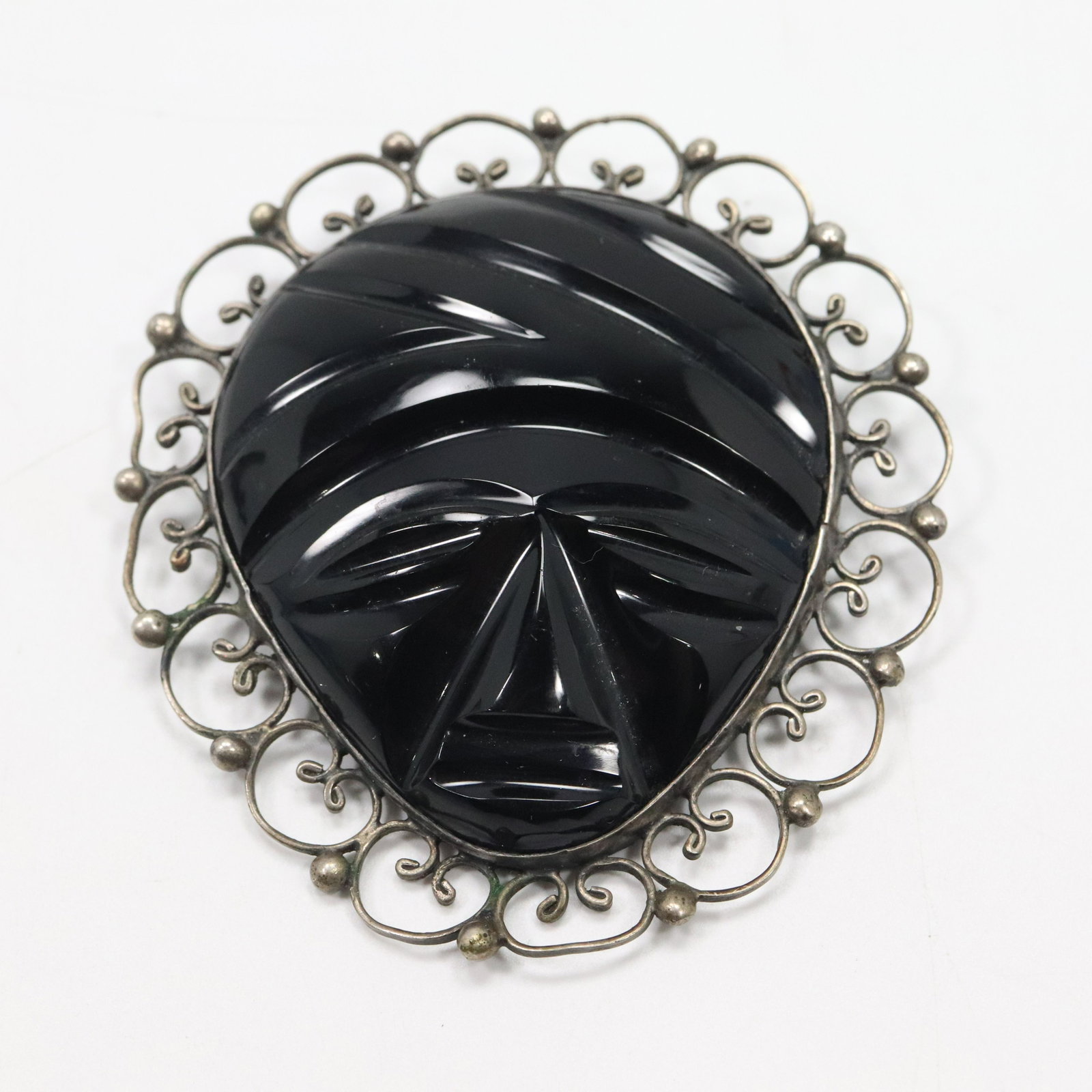 Made in Mexico Silver Black Onyx Native Face Brooch: Made in Mexico Silver Black Onyx Native Face Brooch. Size: 3 in. x 2 1/2 in.