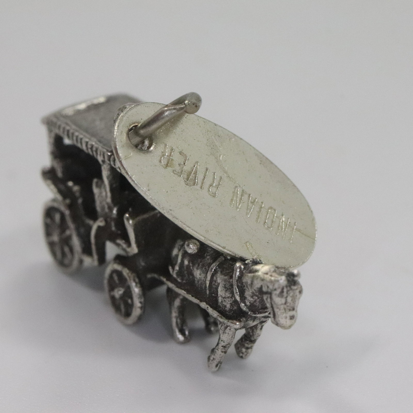 Sterling Silver Indian River Horse & Carriage Charm: Sterling Silver Indian River Horse & Carriage Charm. 1 in. x 1/2 in.