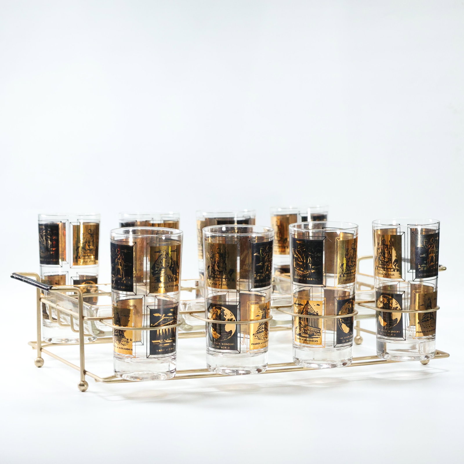 Mid-Century Modern Metal Caddy, 8 Glasses, 4 Glass Tray: Mid-Century Modern Metal Caddy, 8 Glasses, 4 Glass Trays. Size: caddy (4 x 17.75 x 11), cups (5.75 x 2.75)