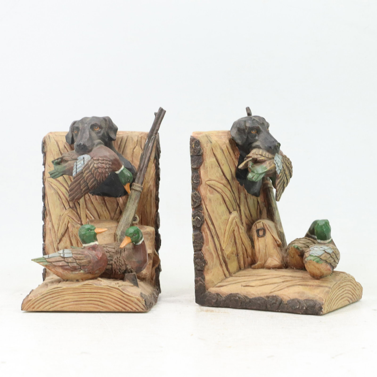 Duck Hunting Sportsman Bookends in Hard Composition: Duck Hunting Sportsman Bookends in Hard Composition. Original paint finish. Size: 6.25h 4.25w