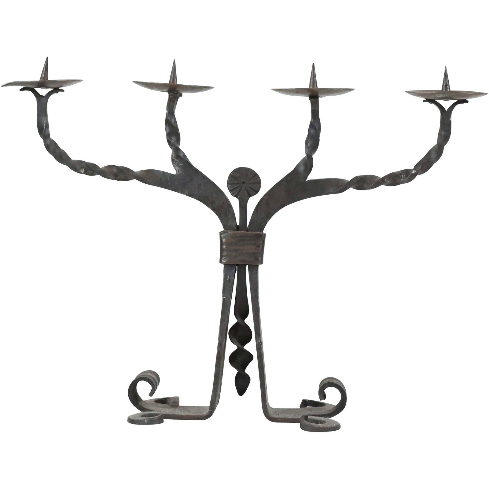 Spanish Colonial Hand Wrought Iron Candelabra: Spanish Colonial Hand Wrought Iron Candelabra. Hand wrought and decorated iron four(4) light pricket candelabra; 13.5in.H. x 18in.W.