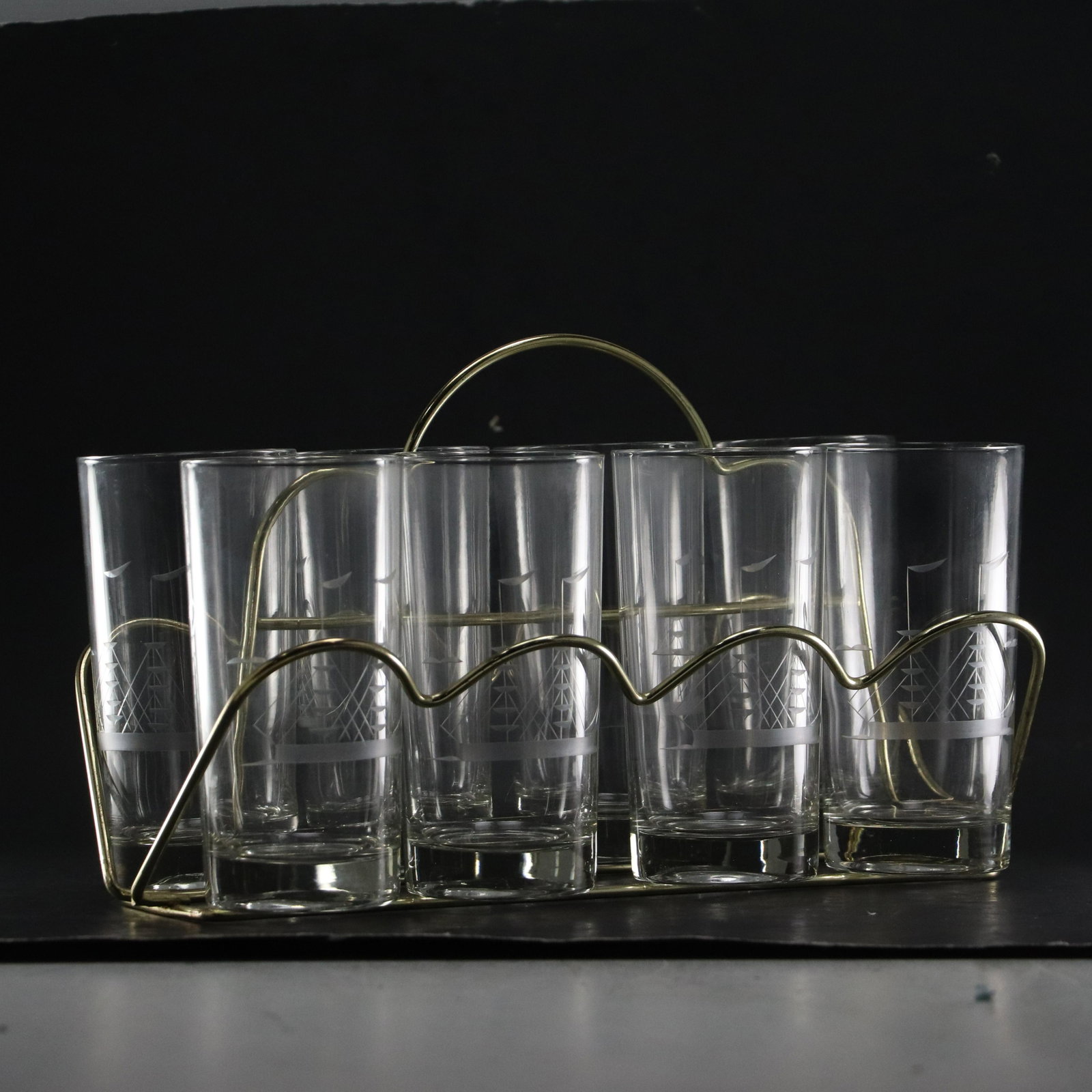 Etched Tall Ships 8 glasses with Caddy Holder and Cocktail Pitcher: Etched Tall Ships 8 glasses with Caddy Holder and Cocktail Pitcher size: x8 glasses 5.75h 2.75w holder 7.25h 12.25w pitcher 10.5h 7w