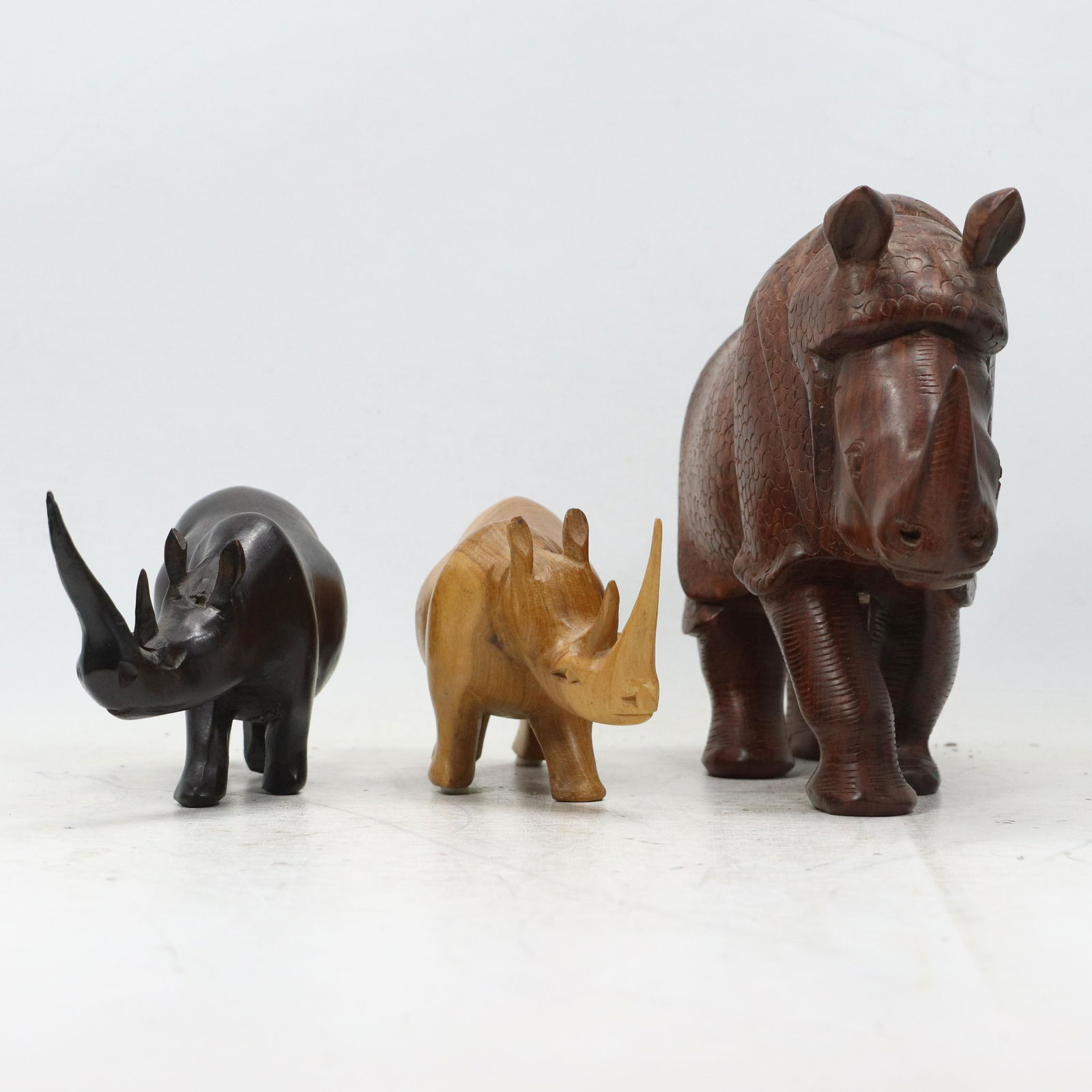 [3] Three Assorted Teak Wood RHINO Figure Statues (1 of 13)