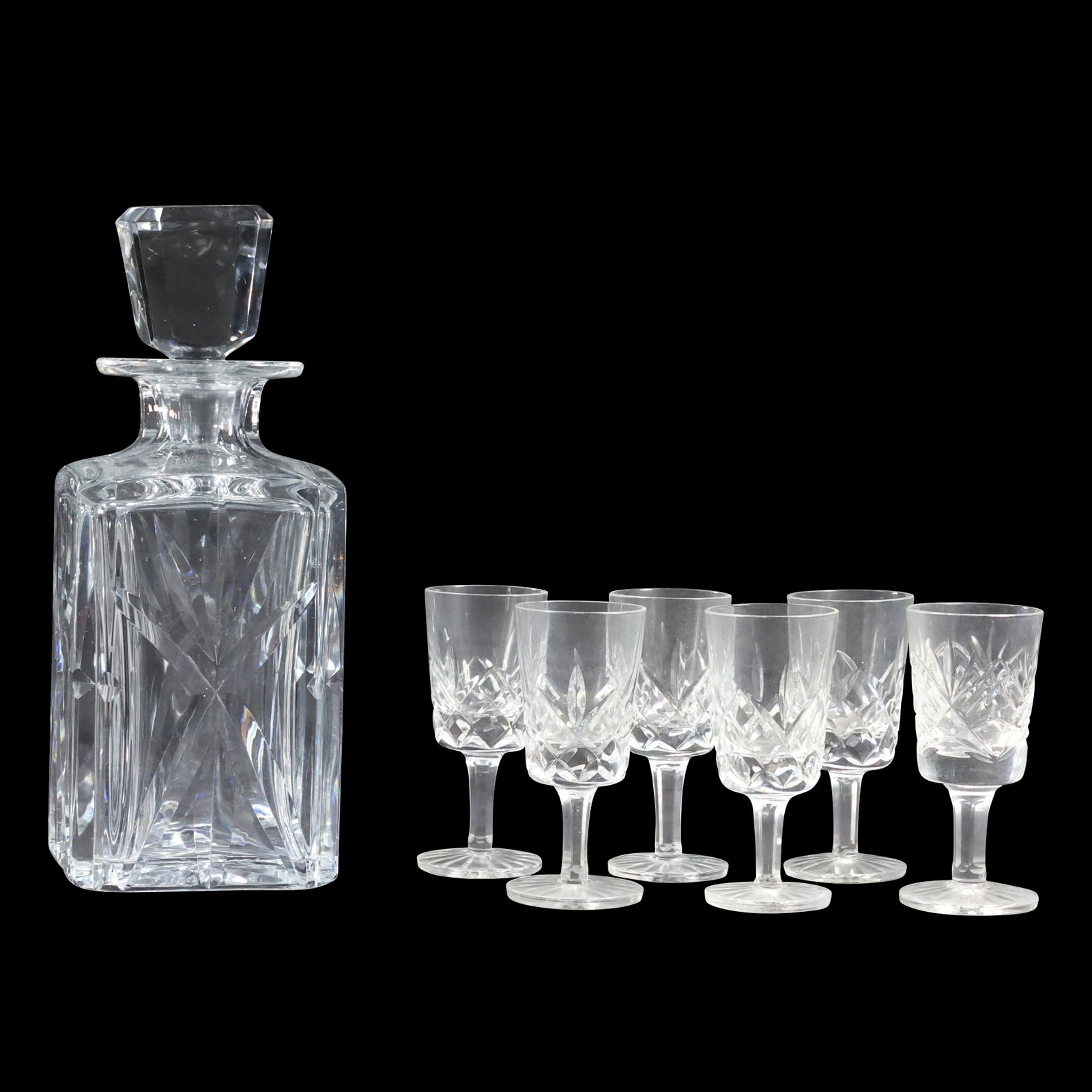 Elegant Glass Liquor Decanter with 6 Elegant Glass Cocktail Stemware: Elegant Glass Liquor Decanter with 6 Elegant Glass Cocktail Stemware. size: 6x glasses (4 x 1.75), decanter (9.5 x 3.75)