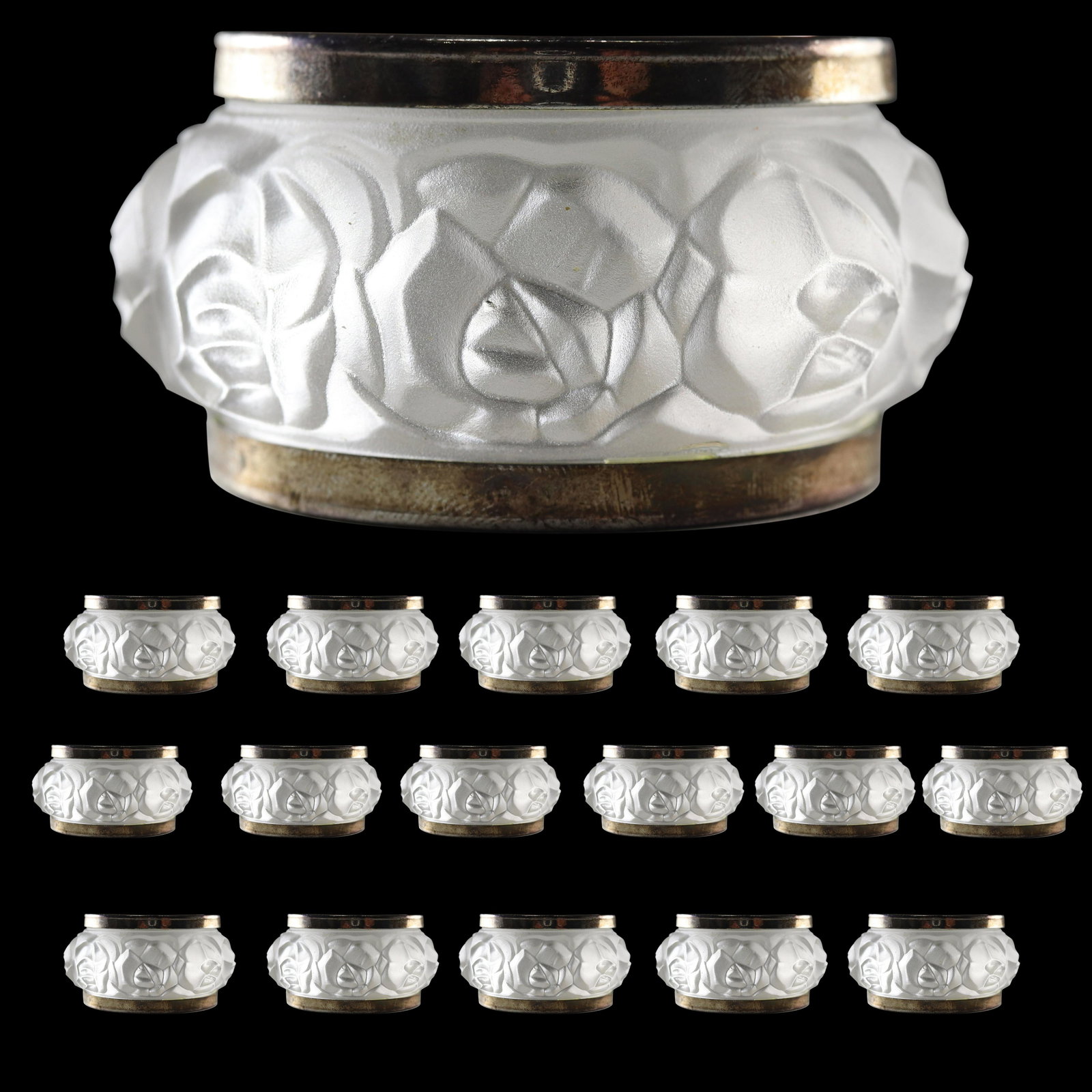 [16] Sixteen Lalique Style Satin Glass Embossed Roses Napkin Rings: [16] Sixteen Lalique Style Satin Glass Embossed Roses Napkin Rings. size: 1.25h 2.25w