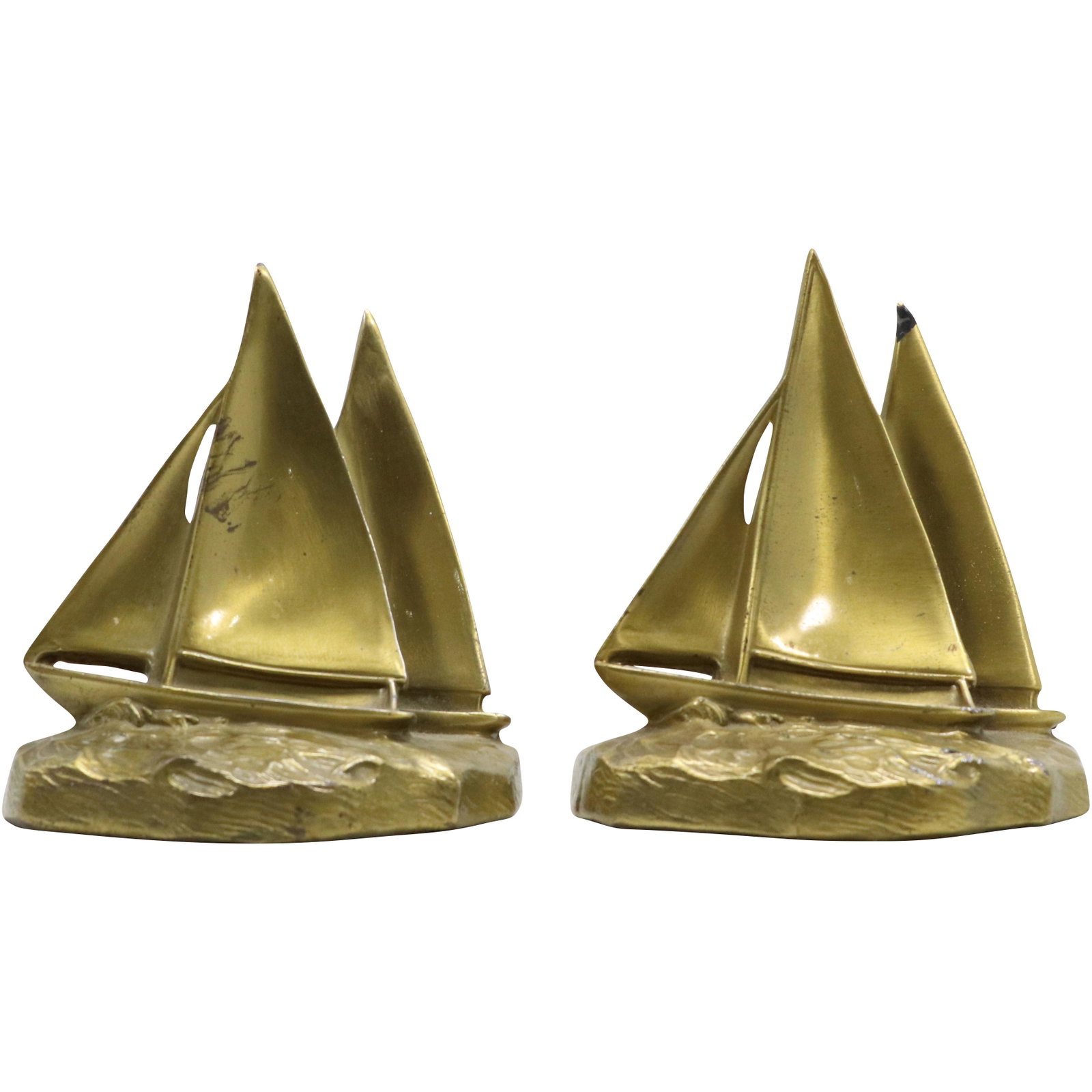 Vintage Cast Metal Sail Boat Sloop Bookend in Original Patina Finish: Vintage Cast Metal Sail Boat Sloop Bookend in Original Patina Finish. size: 5.5h 5w