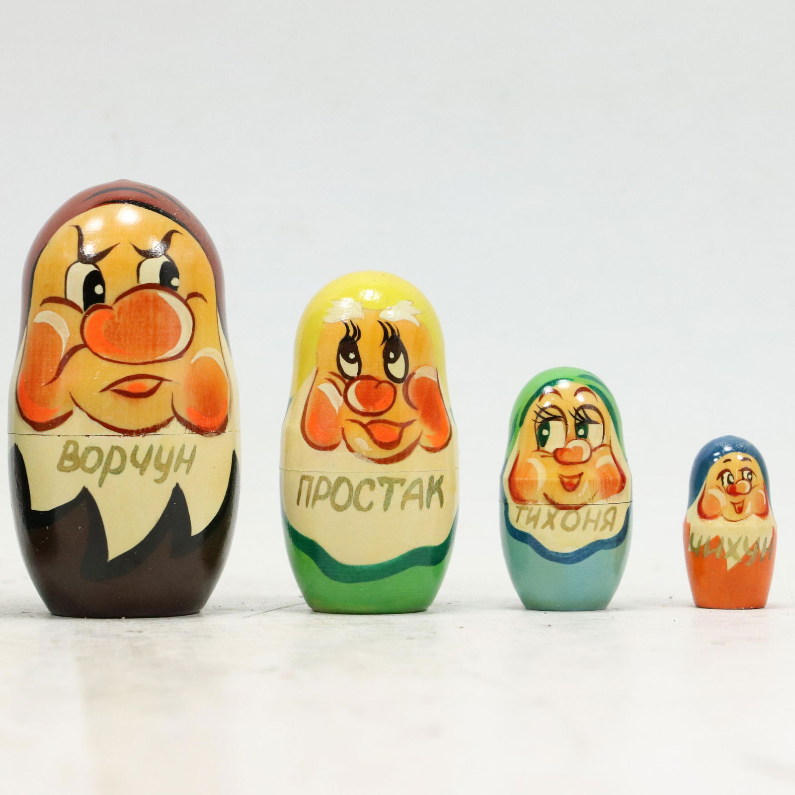 Nesting of 7 Russian Wood Dolls "Snow White, Dwarfs" Graduated Size Characters: Nesting of 7 Russian Wood Dolls "Snow White, Dwarfs" Graduated Size Characters. size: 8.25h 4w