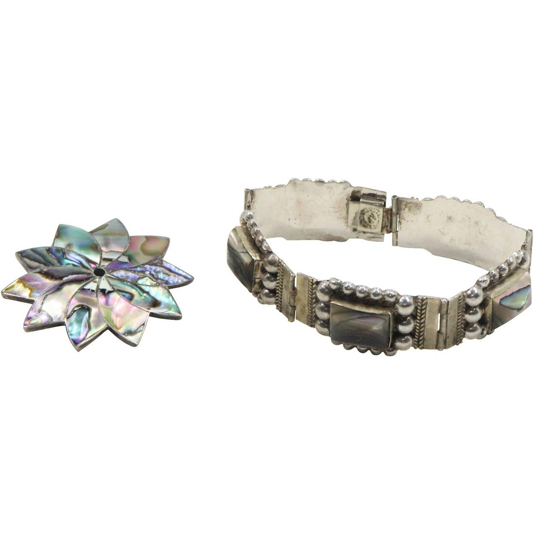 Sterling Silver Mexico Abalone Stones Bracelet and .925 Sterling Taxco Abalone Star Pin: Sterling Silver Mexico Abalone Stones Bracelet 7 in. x 3/4 in. and .925 Sterling Taxco Abalone Star Pin 1 7/8 in. diameter.