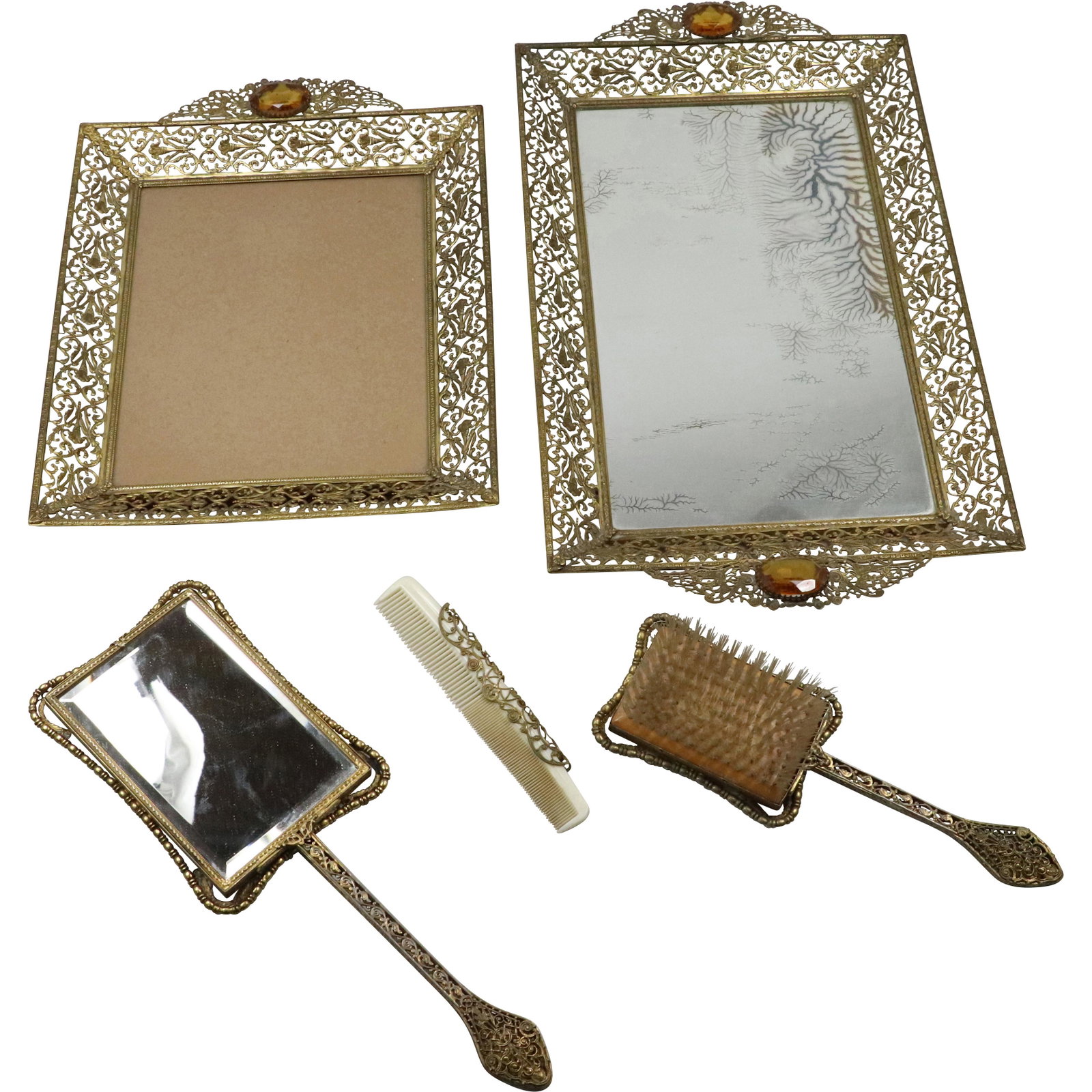 5 Pc Fancy Metal Circa 1940s Mirrored Dresser Tray, Picture Frame,Hand Mirror, Brush, Comb: 5 Pc Fancy Metal Circa 1940s Mirrored Dresser Tray, Picture Frame,Hand Mirror, Brush, Comb. size: frame 14.25h 11w brush 10.5h 3.5w hair 7.251.25w tray 2h 19.5w 11L mirror 14.25h 5w