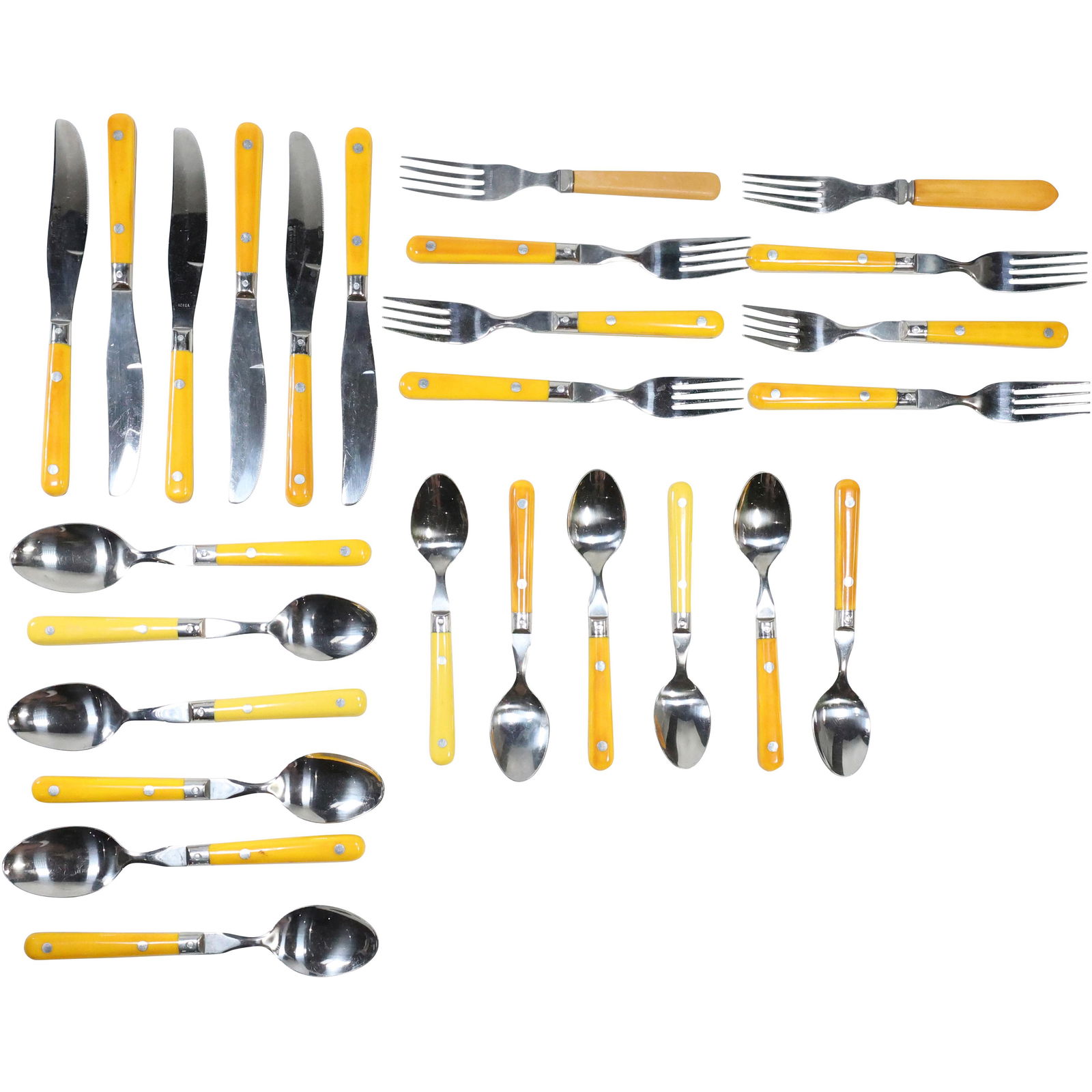 Yellow Bakelite Handles Flatware: Yellow Bakelite Handles Flatware - See pictures for item count.