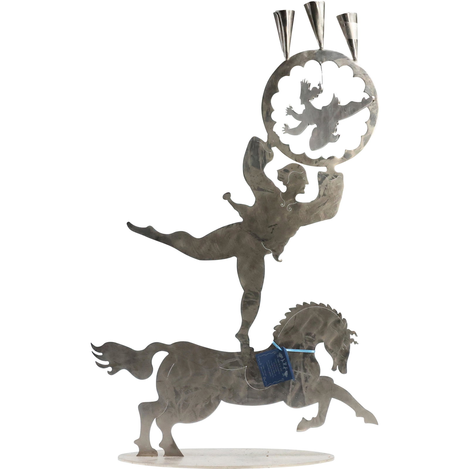 Signed Amy Hess, Ark NY, Nickel Plated Steel Cut-Out Sculpture Figure on Horse Candelabra: Signed Amy Hess, Ark NY, Nickel Plated Steel Cut-Out Sculpture Figure on Horse Candelabra. Has original tag. size: 27.5 x 17.5