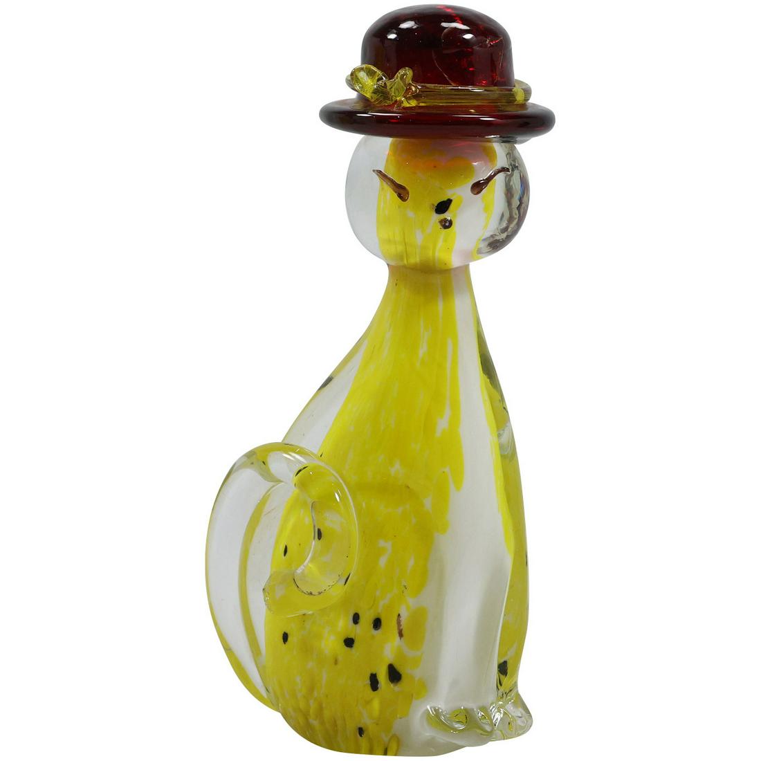 Yellow Art Glass CAT WEARING A HAT Figurative Sculpture: Yellow Art Glass CAT WEARING A HAT Figurative Sculpture. size: 8.5h 4w