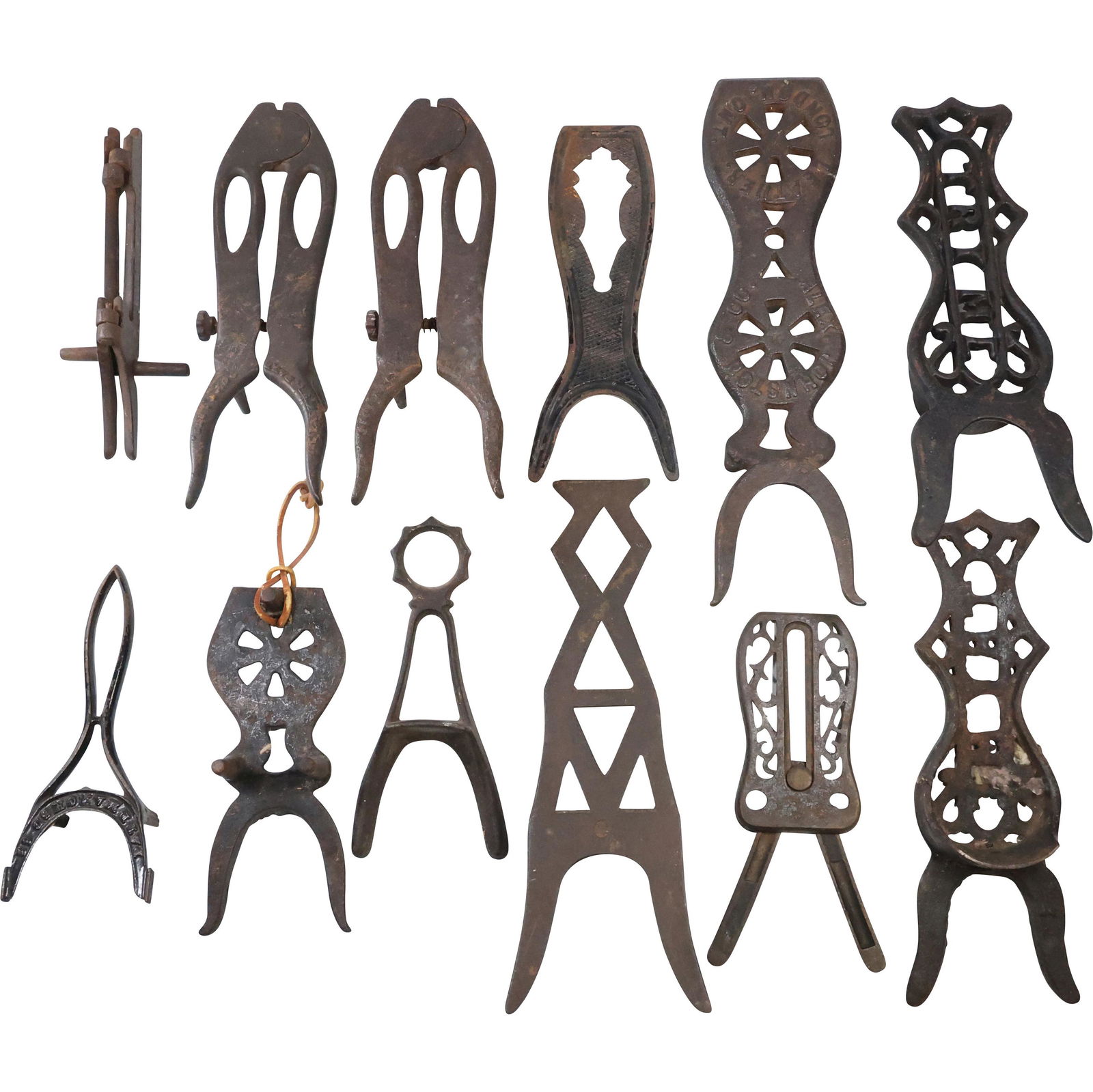 Estate Collection of 16 Assorted Antique Cast Iron Bootjacks (1 of 12)
