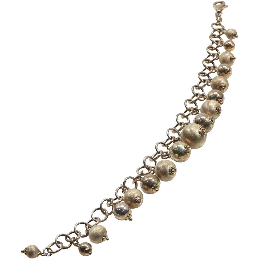 .925 Sterling Silver 17 Hanging Balls Bracelet: .925 Sterling Silver 17 Hanging Balls Bracelet. 8 in. x 3/4 in.
