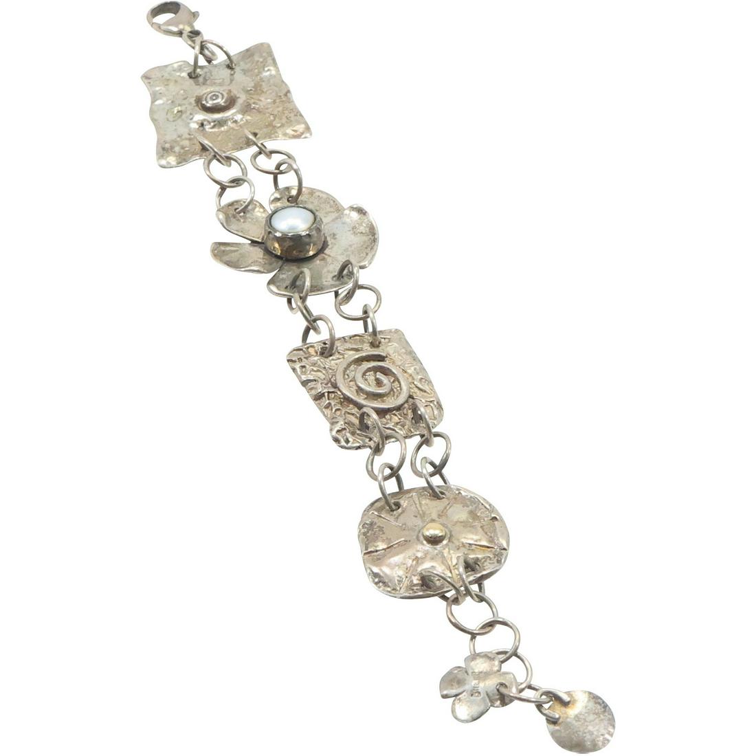 Sterling Silver marked Sherry Tinsman Decorated Panels with 2 ID Charms Bracelet: Sterling Silver marked Sherry Tinsman Decorated Panels with 2 ID Charms Bracelet, 4-Panels, [1] 14K Center Dot, [3rd] Tahitian Pearl. size 8 in. x 1 1/4 in.