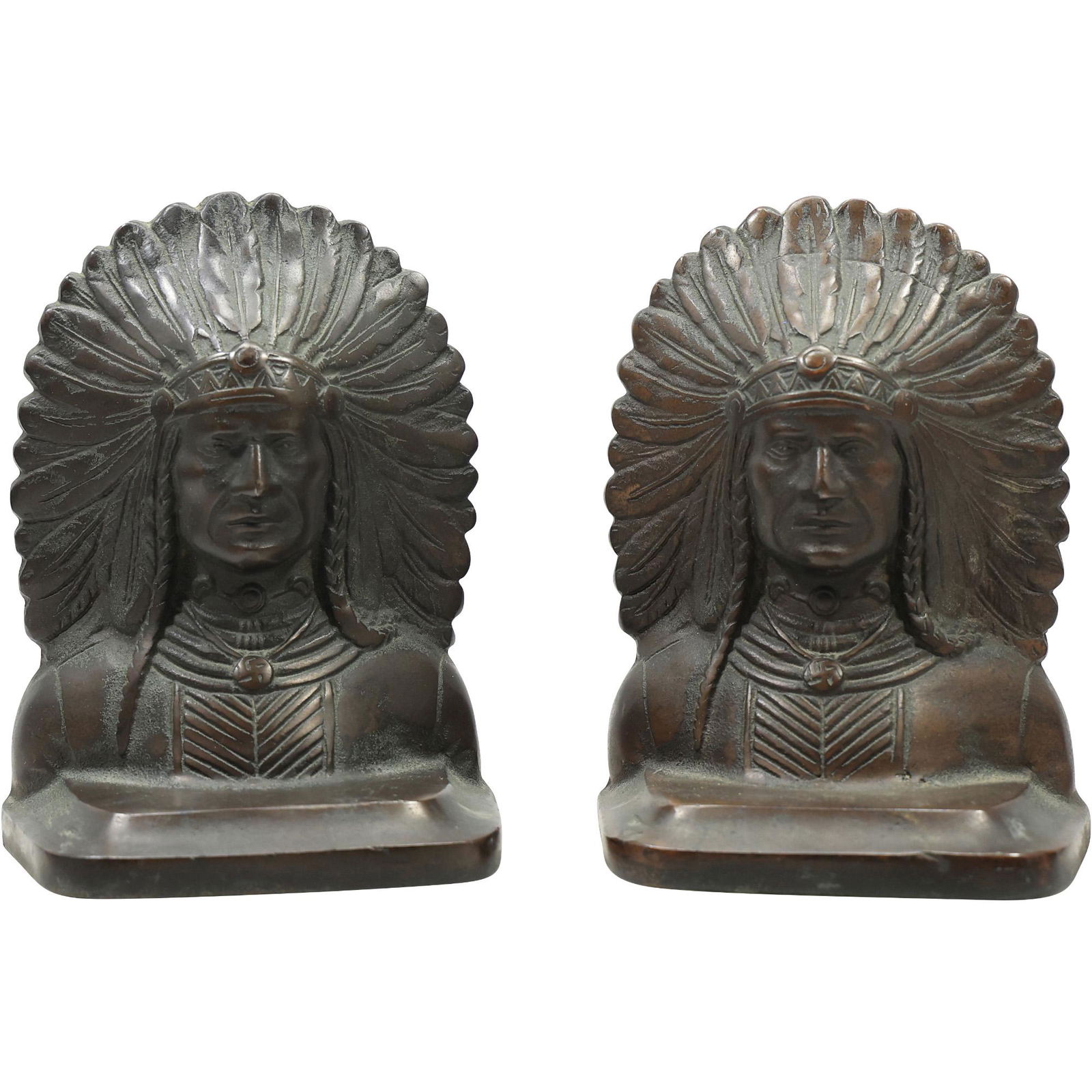 Circa 1920 Cast Iron Indian with Full Headdress Bookends - Original Patina: Circa 1920 Cast Iron Indian with Full Headdress Bookends - Original Patina. size: 6.25h 4.75w