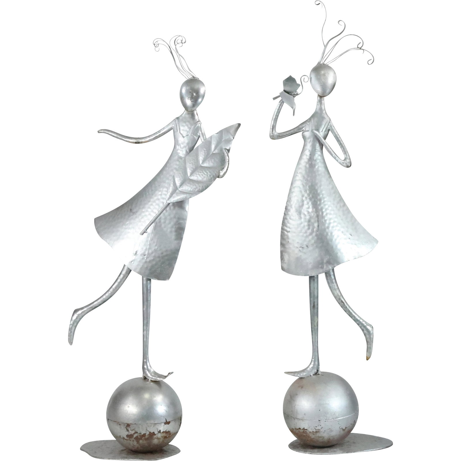 [2] Large Tole Welded Metal Women Figure Sculptures 38.25 inches & 41 inches heights: [2] Large Tole Welded Metal Women Figure Sculptures 38.25 inches & 41 inches heights. Silver tone patina finish. size: (38.25 x 13.5), (41 x 9.5)