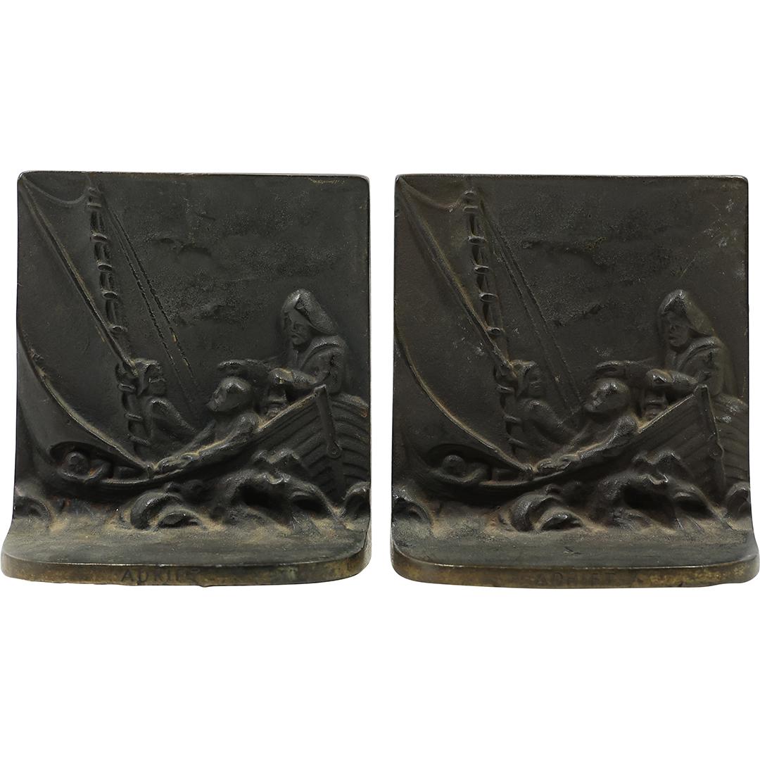 Circa 1920s Cast Iron Nautical Scene Bookends titled "Adrift": Circa 1920s Cast Iron Nautical Scene Bookends titled "Adrift". size: 4.75h 4.5w