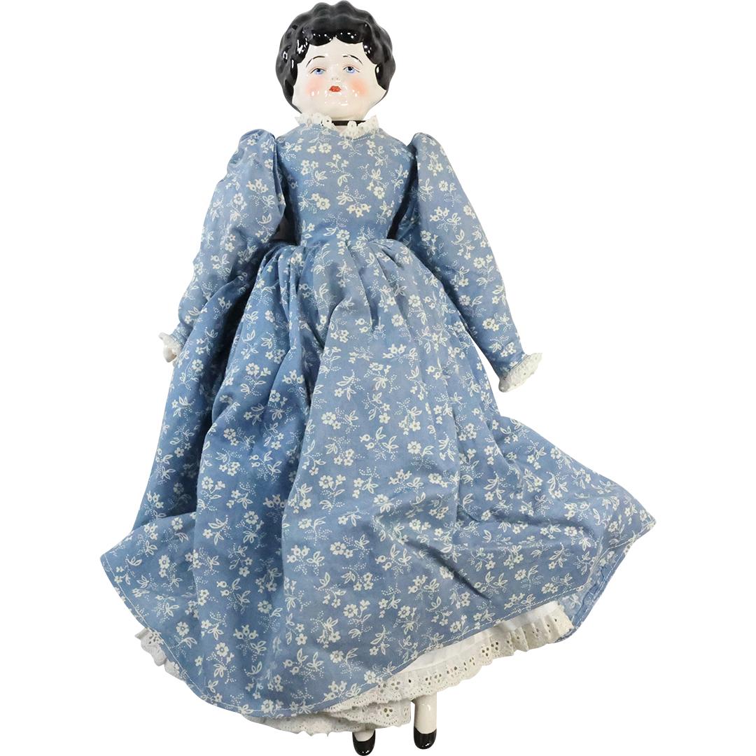Porcelain China Head Doll 15.25 inches length: Porcelain China Head Doll 15.25 inches length. size: 15.25 x 8