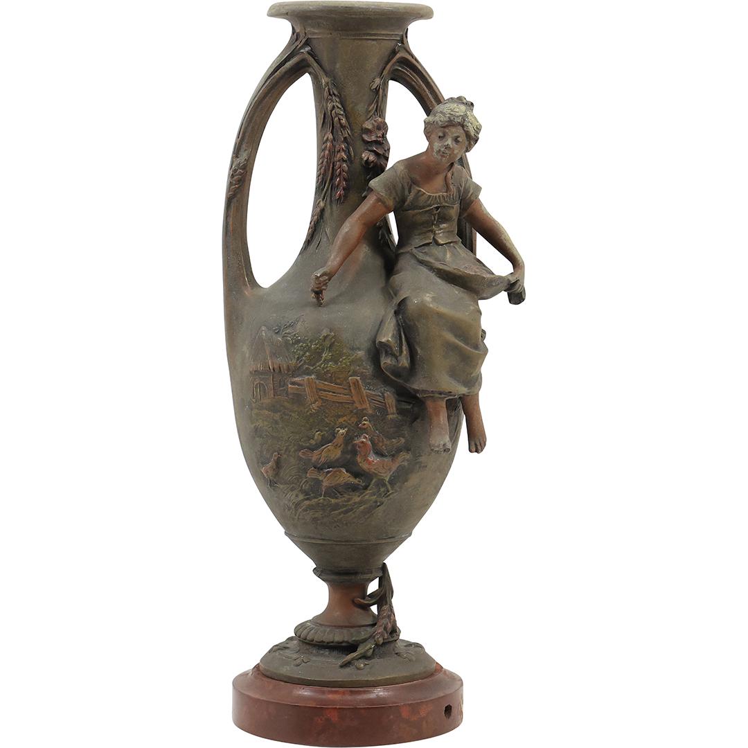 F. Moreau Signed 19th C. Cast Metal Spelter French Vase with Outer Woman Figure: F Moreau Signed 19th C. Cast Metal Spelter French Vase with Outer Woman Figure, Scene of Barn Yard Chickens. Original Patina. size: 15.5 inches height. 5.25 inches wide.