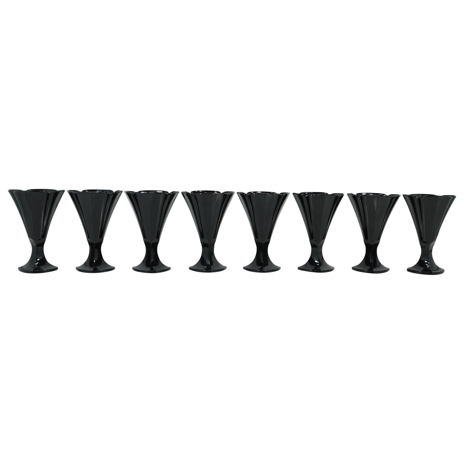 [8] Black Glass Fluted Goblets / or Table Top Vases 6 inches height: [8] Black Glass Fluted Goblets /or Table Top Vases 6 inches height. size: 6x4 THIS AUCTION HAS SPECIAL PICK UP DATES SPECIAL PICK UP DATES AND TIME-LINE, W/ EXTENDED PICK UPS. 5/22 Mon: Auction Day - 