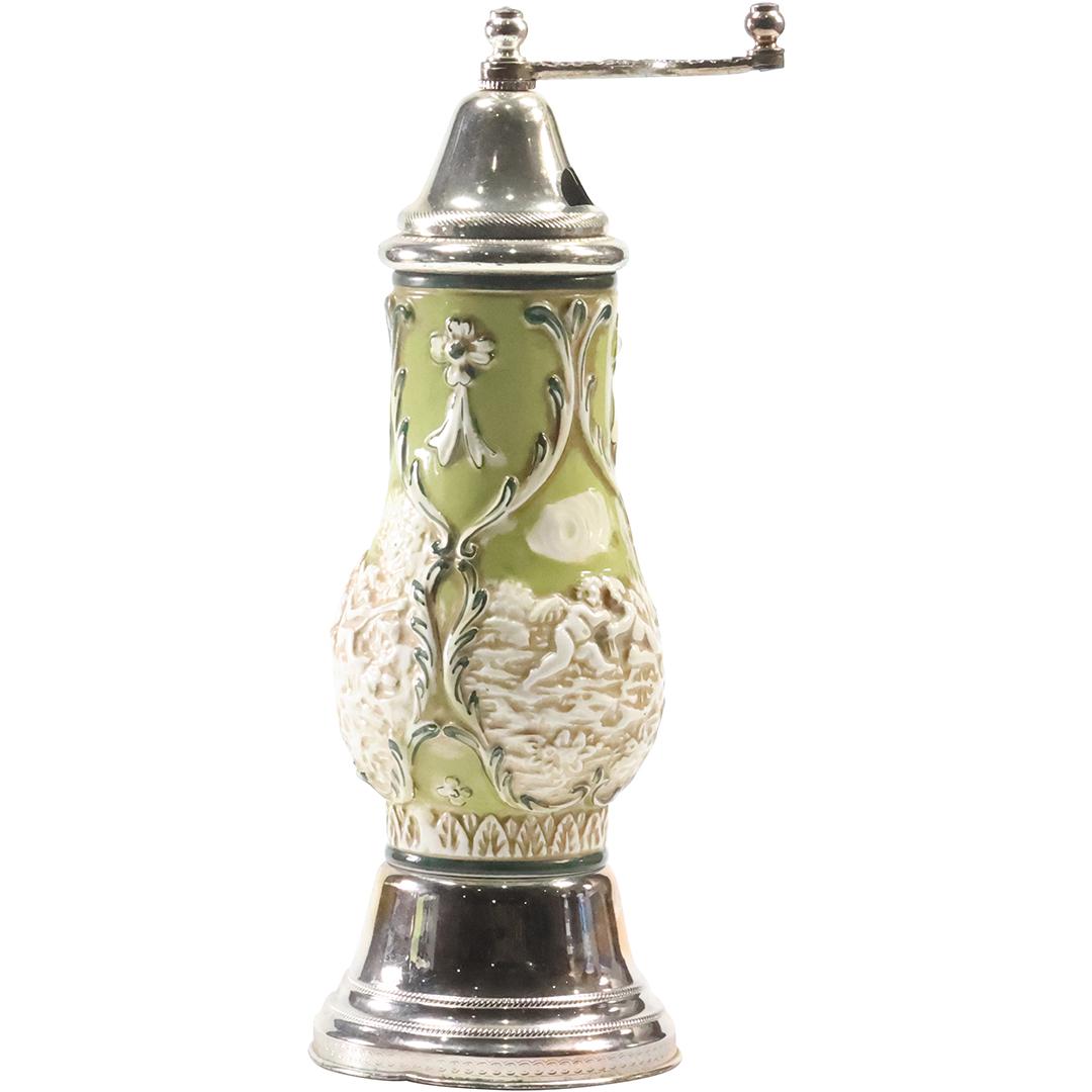 Vintage Reuge Capodimonte Cherub Pepper Mill with Miusic Box Base 10 inches height: Vintage Reuge Capodimonte Cherub Pepper Mill with Miusic Box Base 10 inches height. size: 10 inches x 5 inches THIS AUCTION HAS SPECIAL PICK UP DATES SPECIAL PICK UP DATES AND TIME-LINE, W/ EXTENDED P