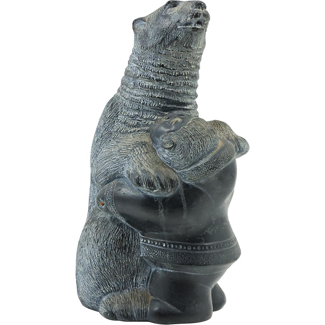Alaskan Bear Hugging Eskimo Figure in Cast Stone 11 inches height, marked Aardvark 1972 Canada (1 of 19)