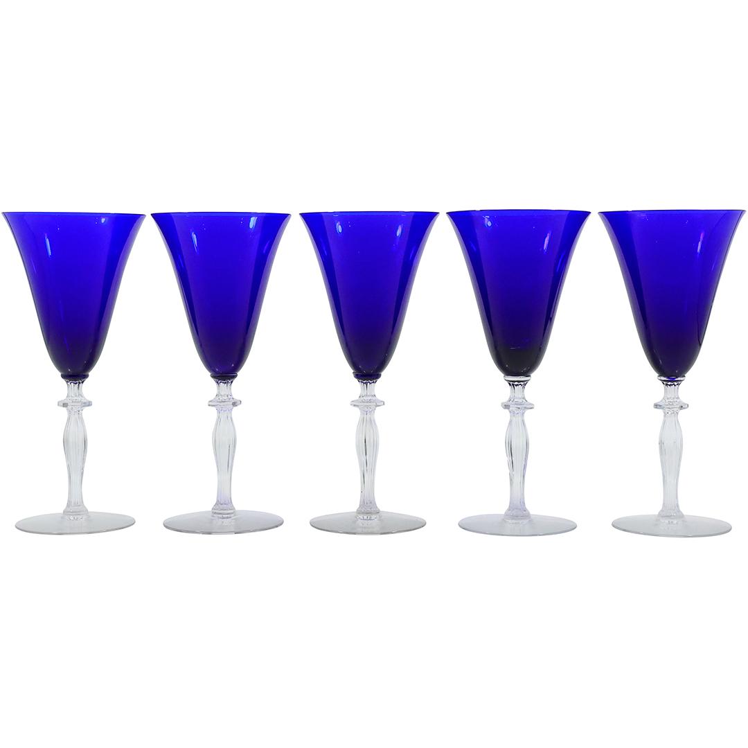 [5] Cobalt Blue Cocktail Stemware Glasses with Clear Stems and Bases: [5] Cobalt Blue Cocktail Stemware Glasses with Clear Stems and Bases. size: 8.5 in. x 3.75 in. THIS AUCTION HAS SPECIAL PICK UP DATES SPECIAL PICK UP DATES AND TIME-LINE, W/ EXTENDED PICK UPS. 5/22 Mo