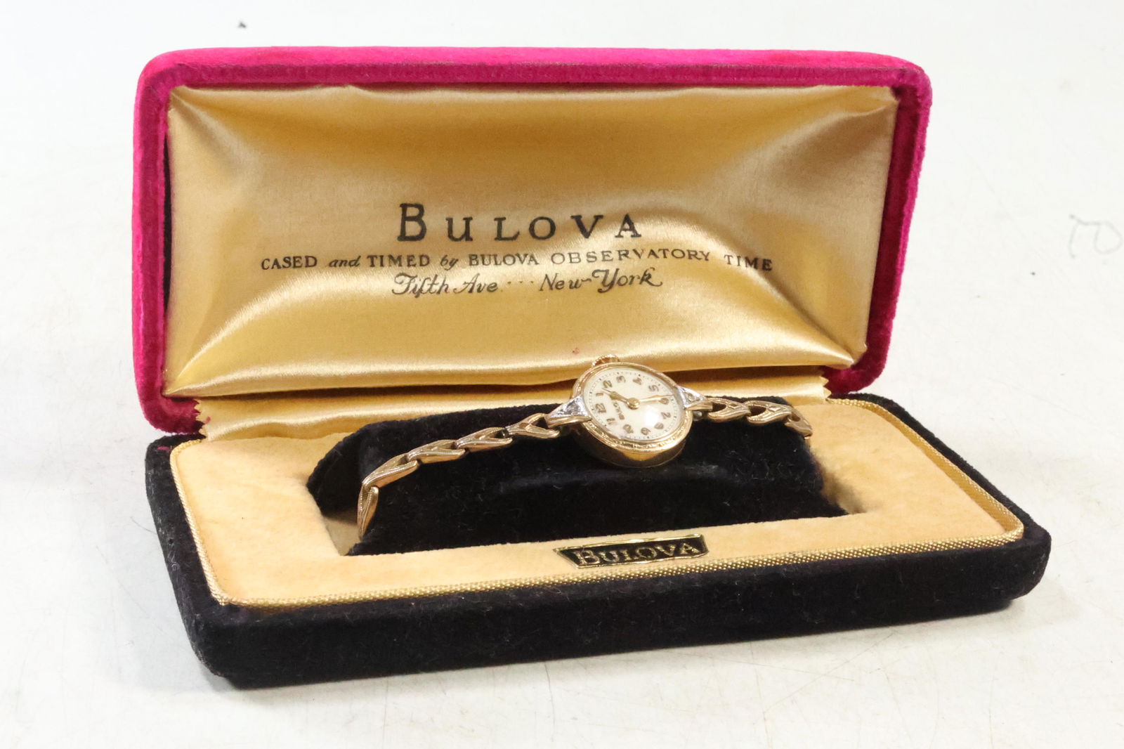 BULOVA 10K GF with Diamonds Ladies Wristwatch in Case, not working: BULOVA 10K GF with Diamonds Ladies Wristwatch in Case, not working. 6 in. x 3/4 in. ; case 5 in. x 2 3/8 in.