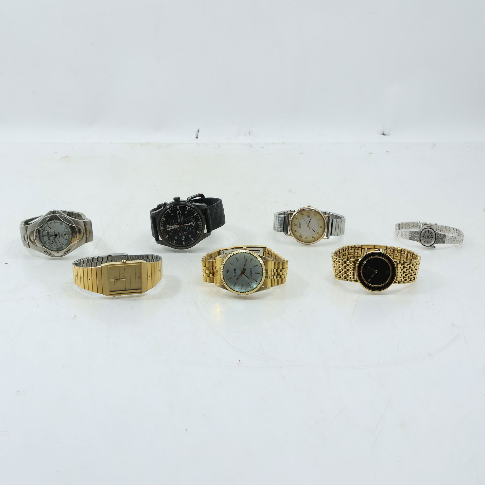 [7] Assorted SEIKO Wrist Watches: 7N29 6809 RI Black Face Gold Tone, 144360 Stainless Quartz (1 of 20)