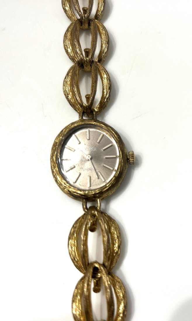ROAMER Ladies Gold Tone Wrist Watch Swiss Made "Boutique" 4688260768: ROAMER Ladies Gold Tone Wrist Watch Swiss Made "Boutique" 4688260768. face 7/8 in., watch 7 1/2 in. x 1 in.